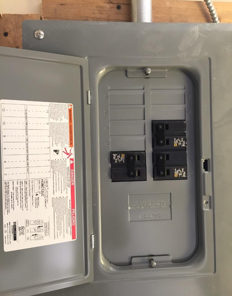 Ok so I hired an electrician. Why would he instal the panel upside down