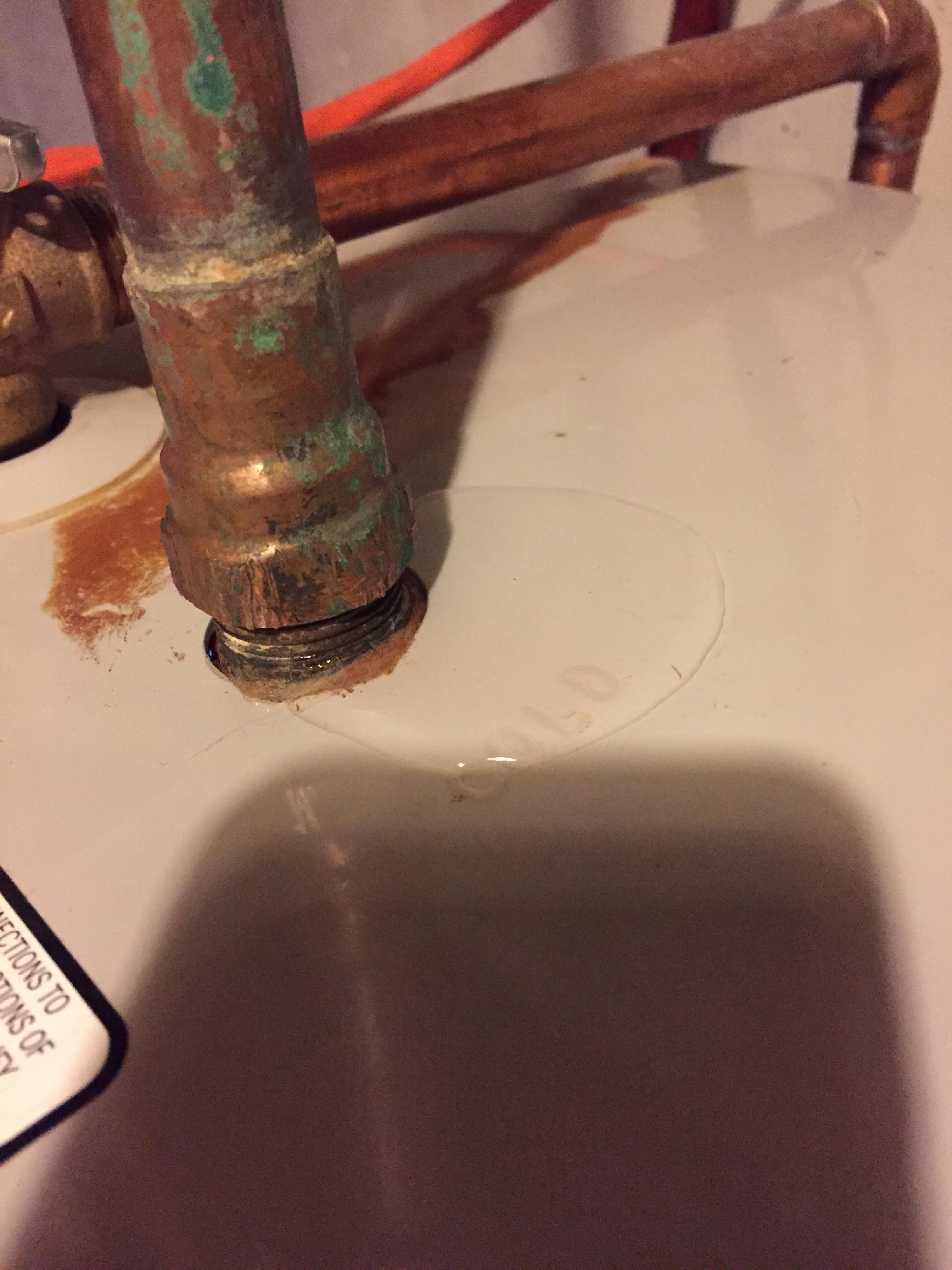 Water heater leak from top Plumbing