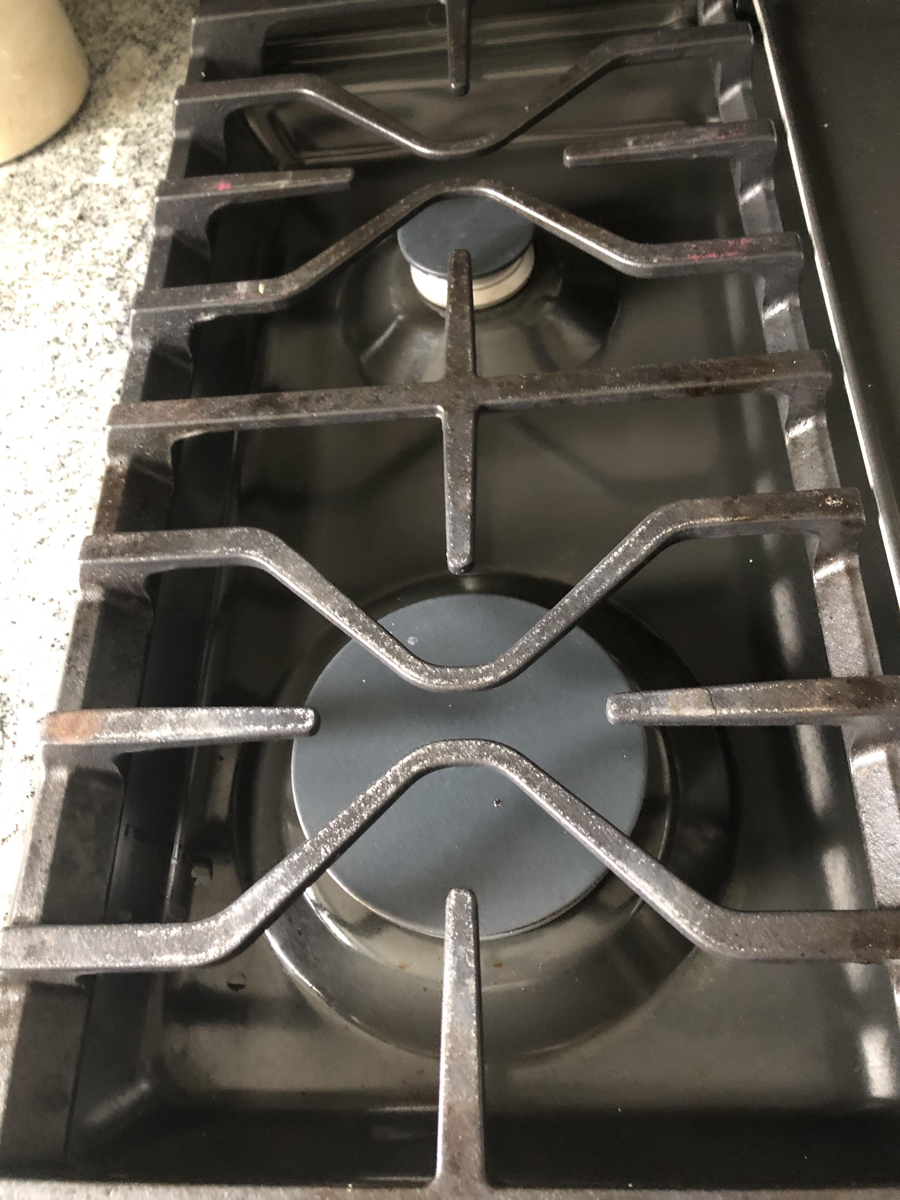 How do you clean these GE stove grates? These are brand new, some oil
