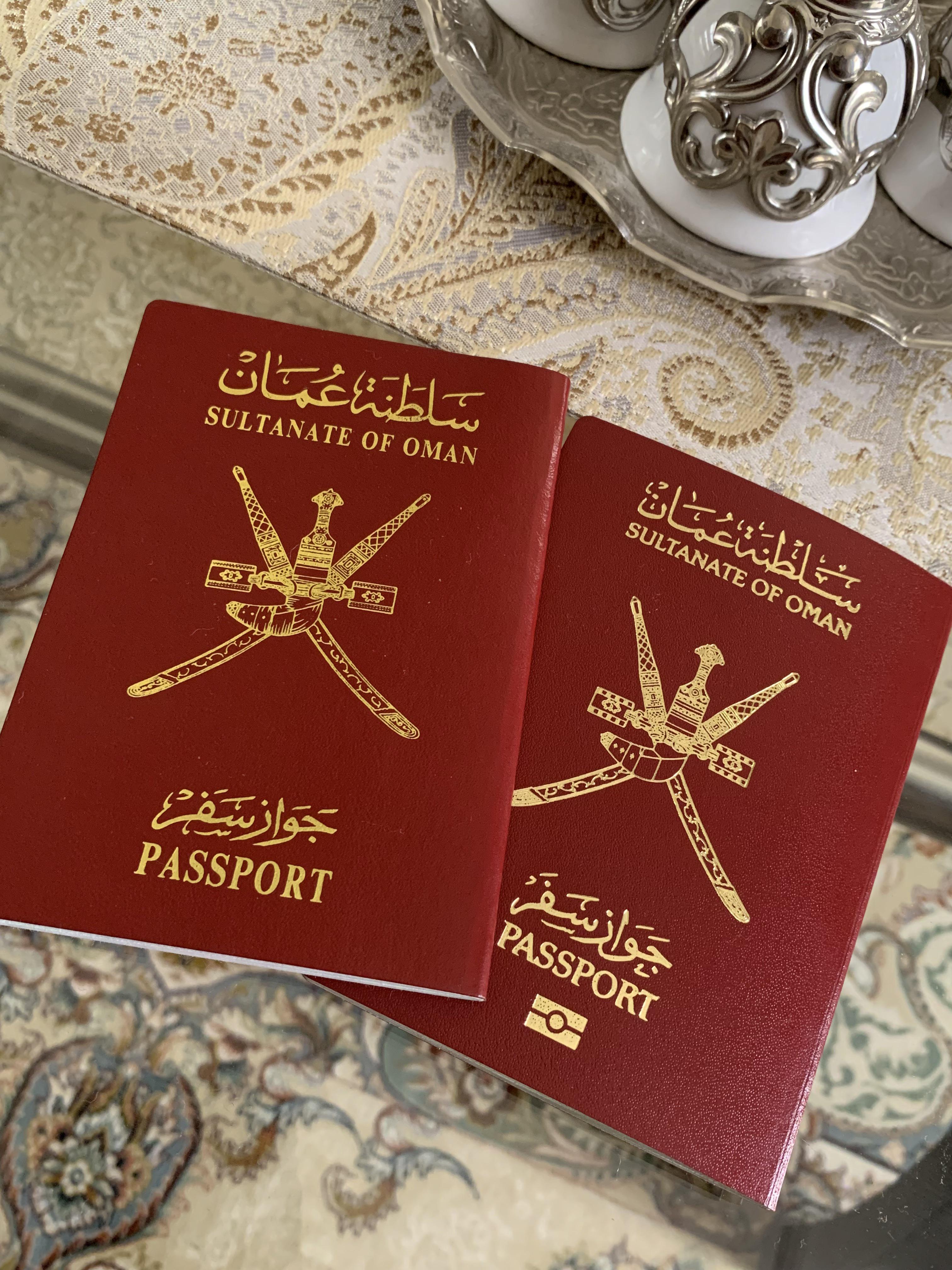 Oh man, Omani passports! Left was the old version and right is the