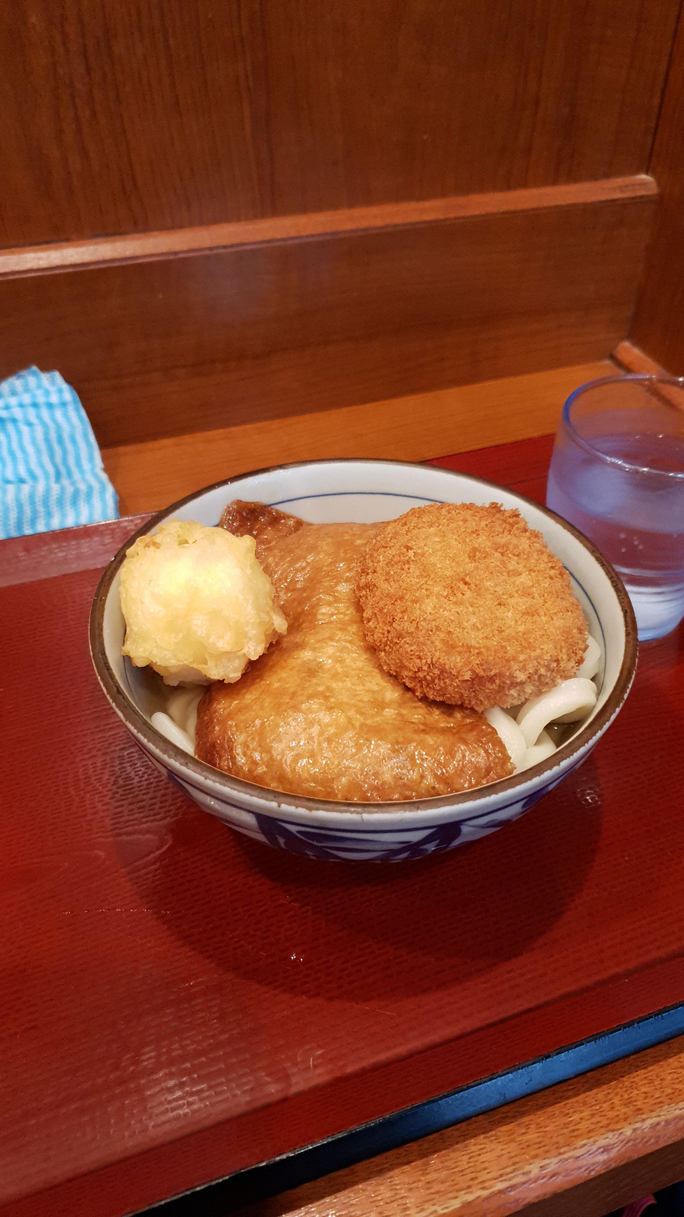 Kitsune udon with a tempura egg and croquette, in Ueno r/JapaneseFood