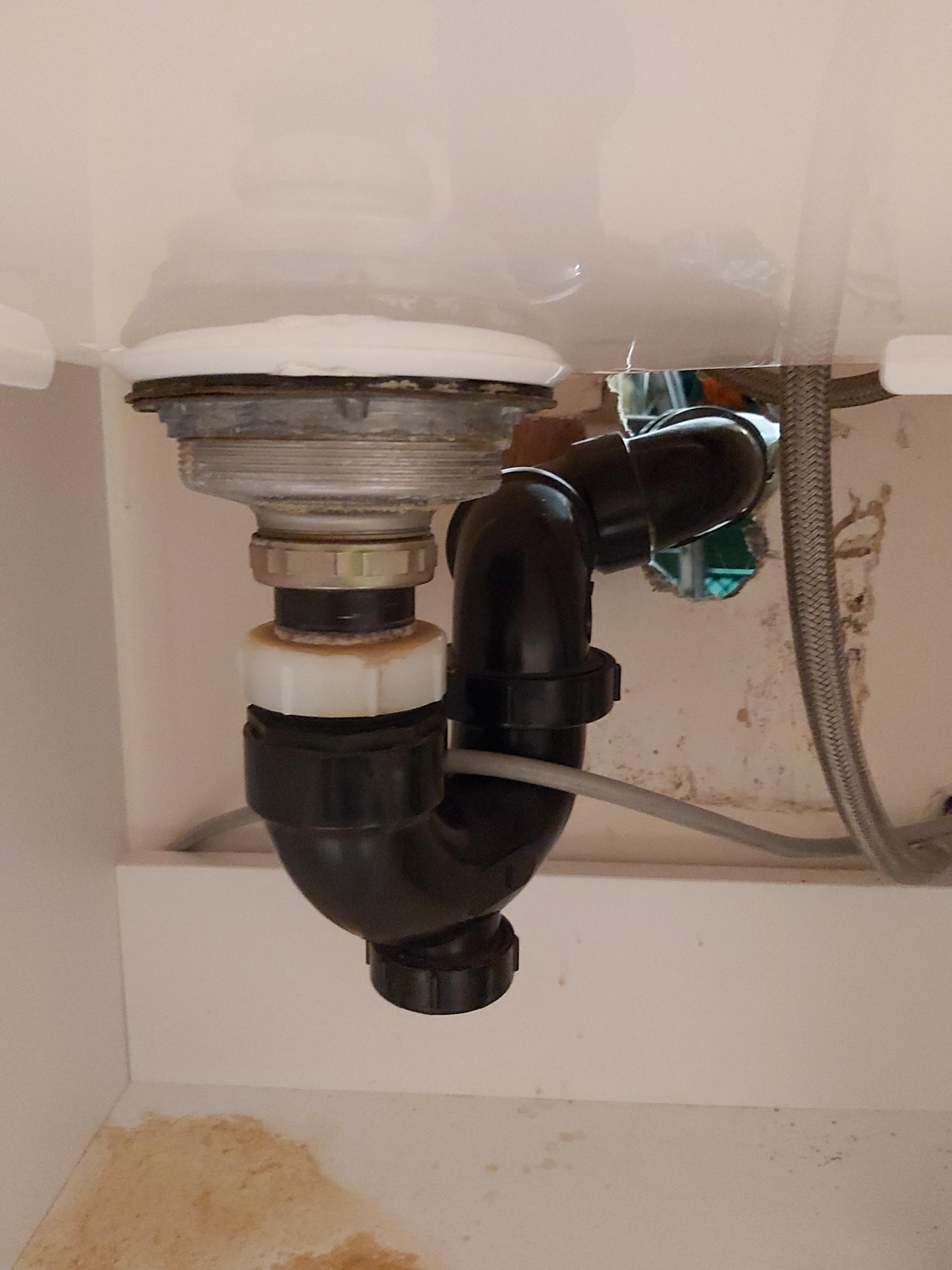 Laundry Tub doesn't drain well and I think its causing sewer gas smells