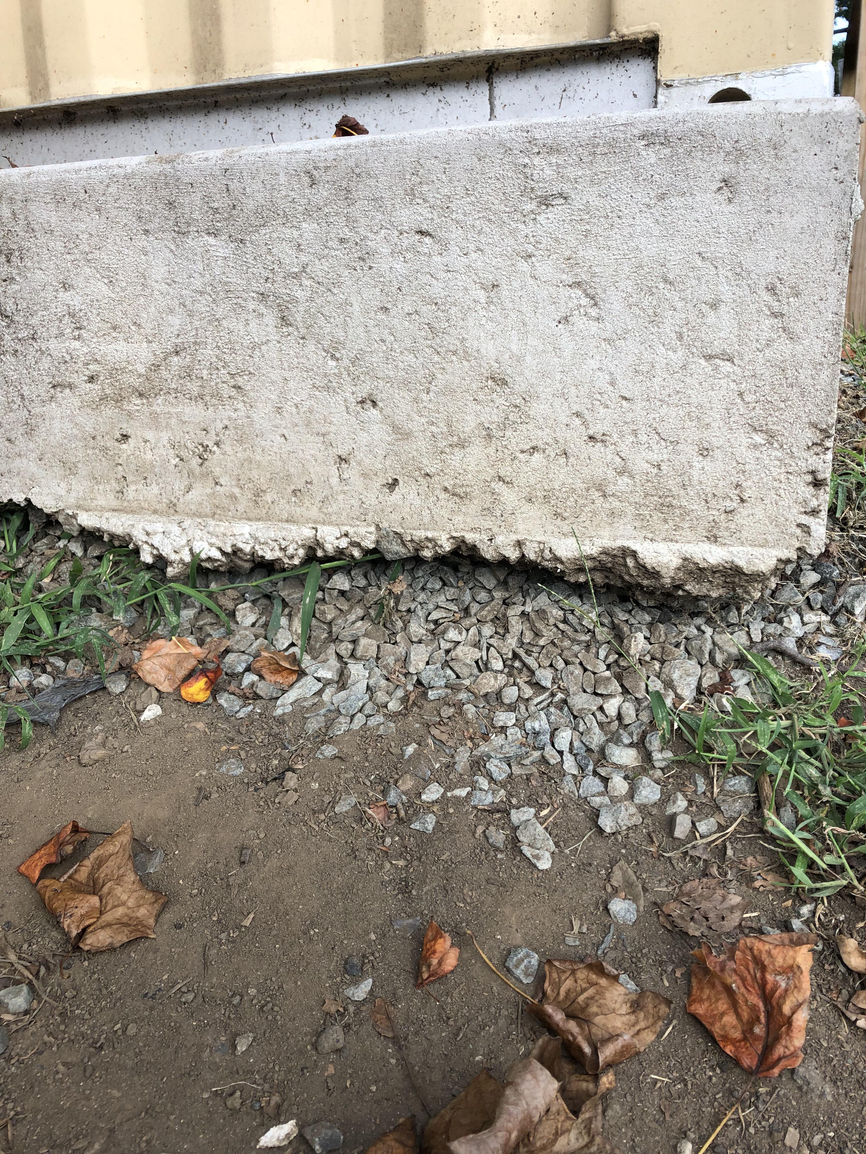 What is the best way to repair this undermined concrete slab, and how
