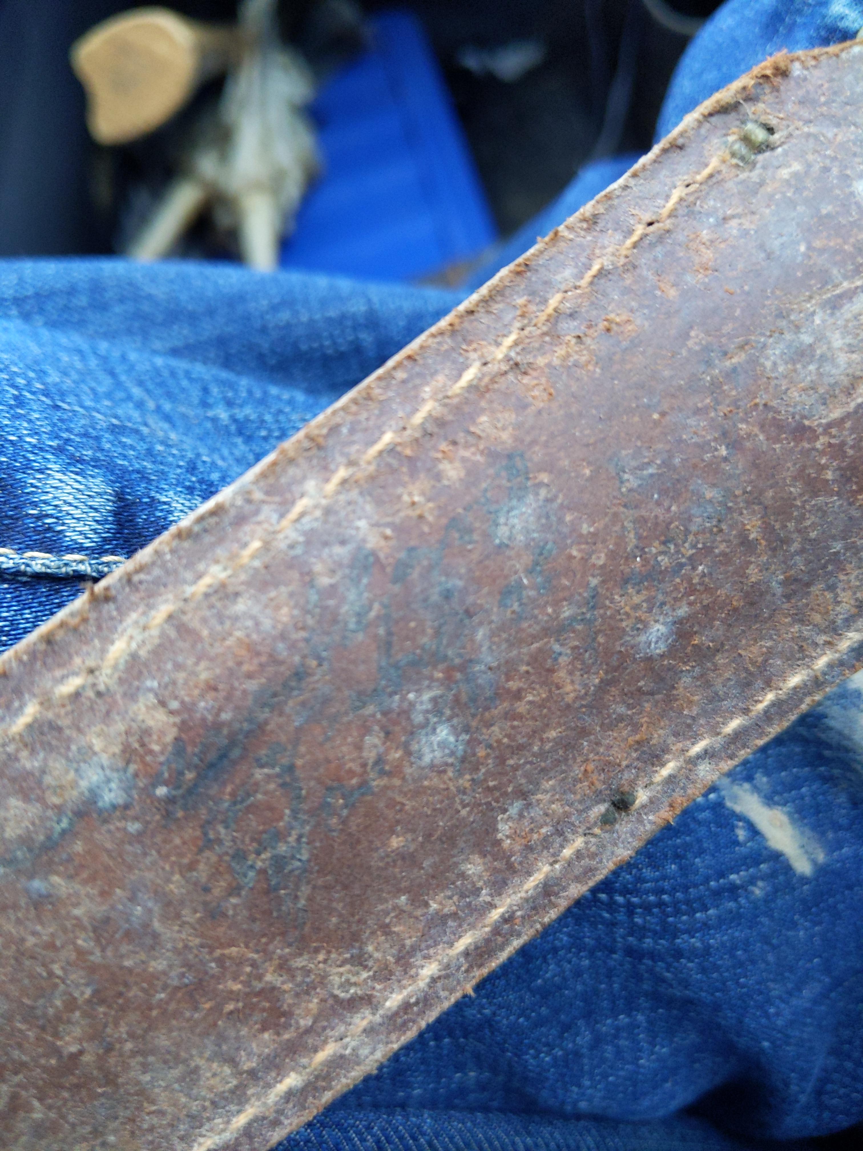 Is there a way to restore this knife sheath so I can read the writing