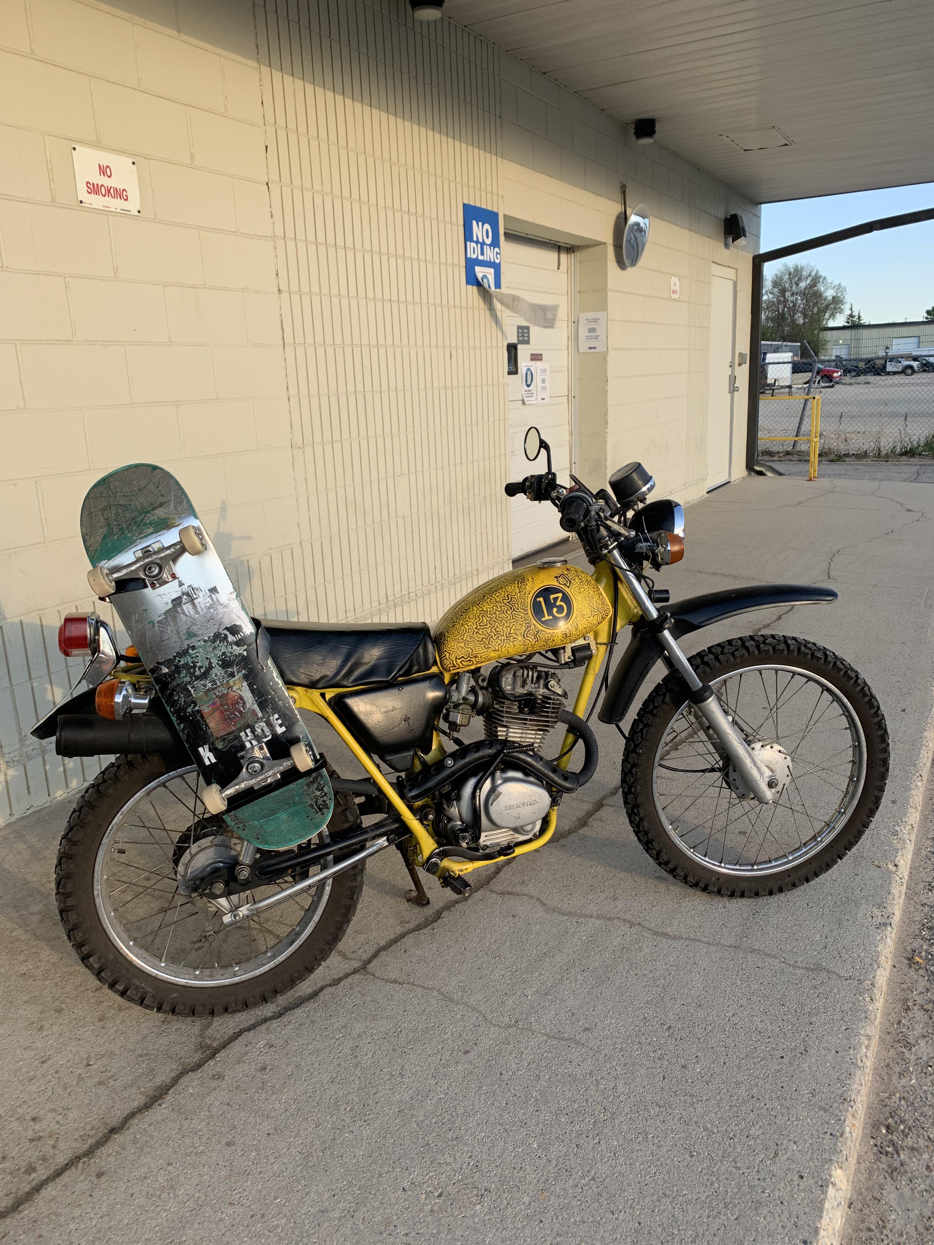 Welded a skateboard holder for my 77 Honda xl r/motorcycle
