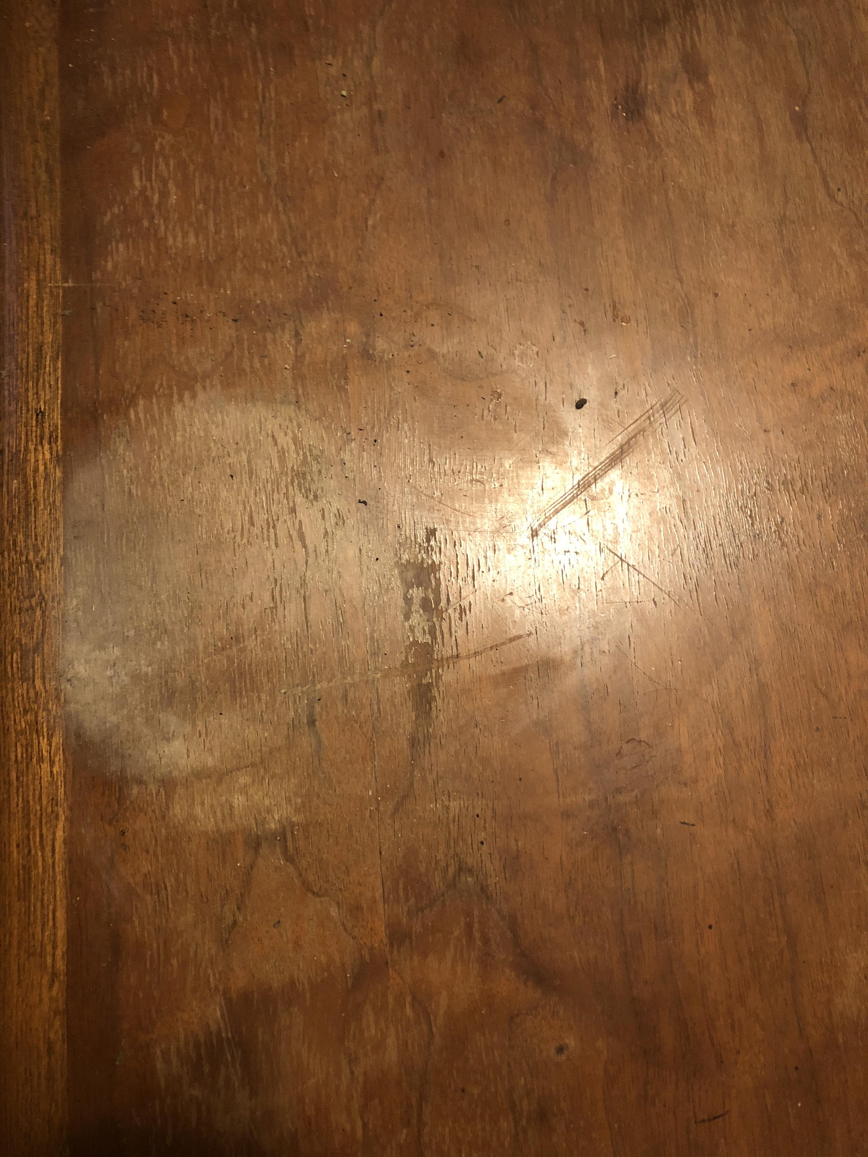 One of my potted plants ruined the top of roommate’s coffee table. I