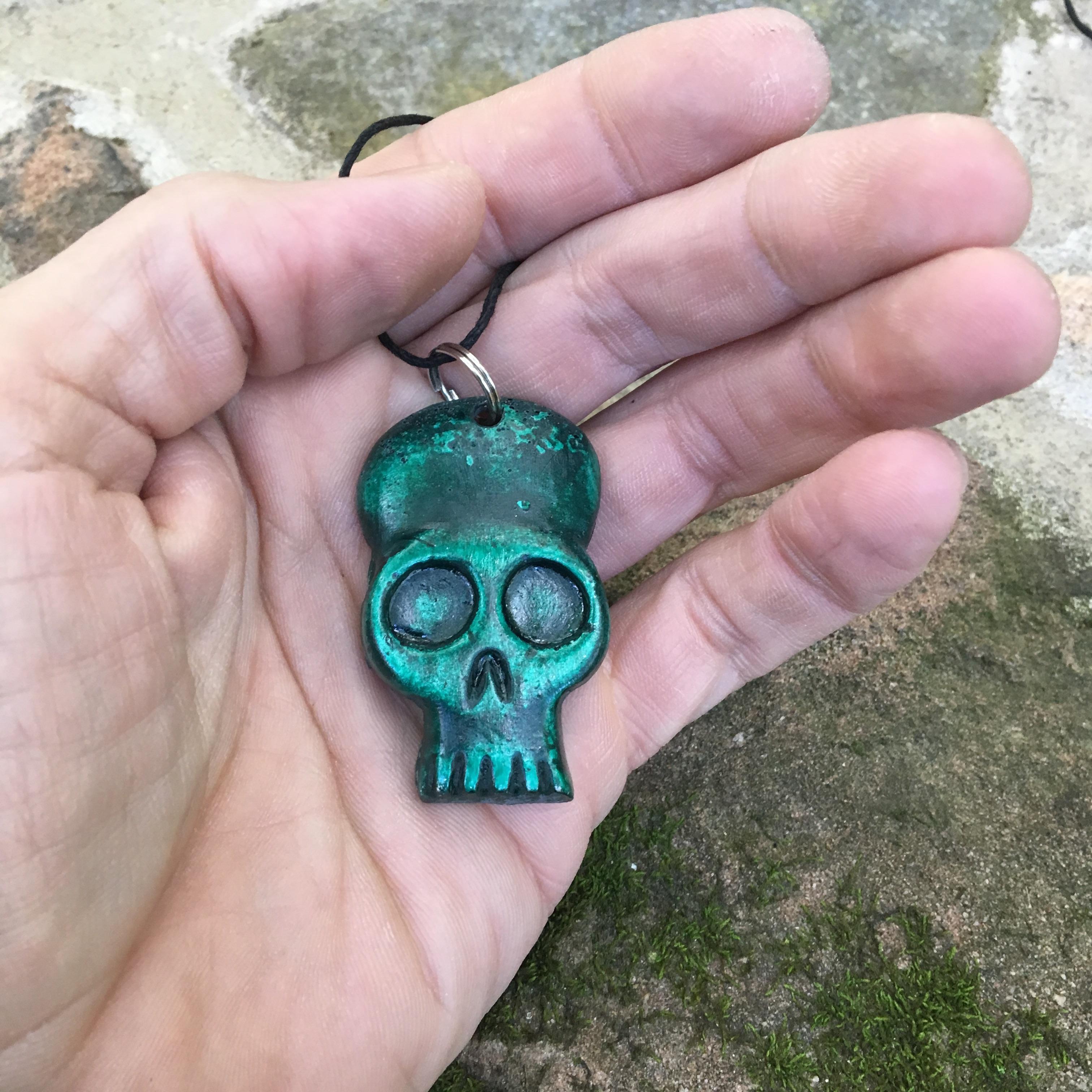 Green skull pendant I made. r/skulls