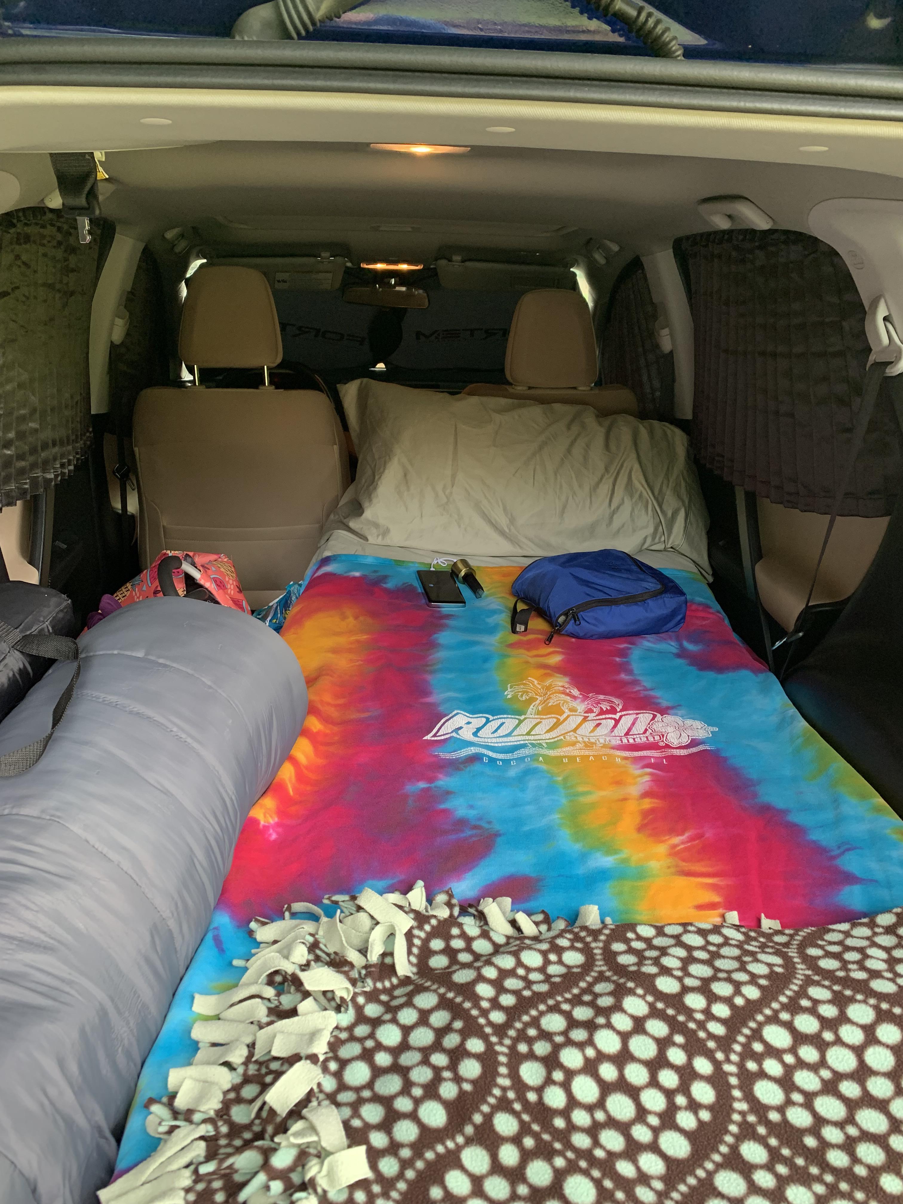 Camping setup with curtains on the door windows!