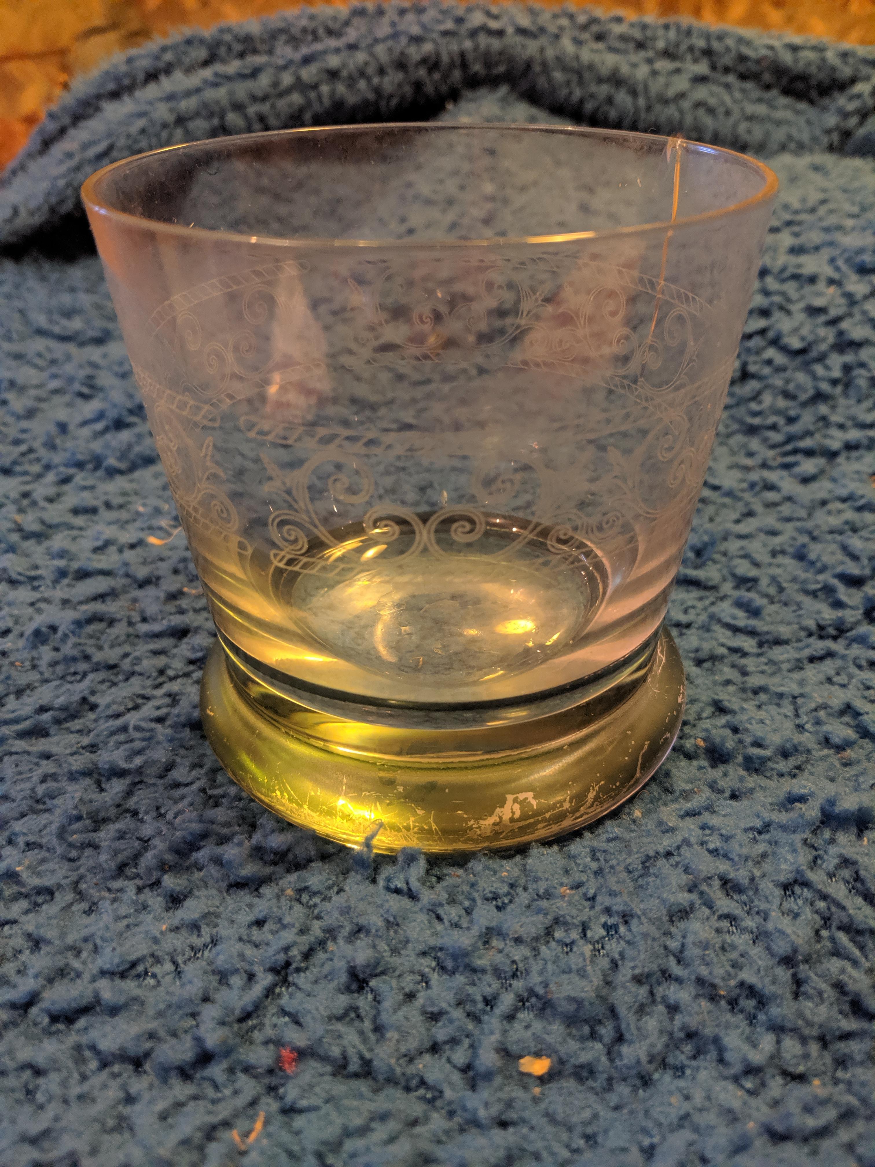 What type of glass is this with a weighted bottom and this shape. What