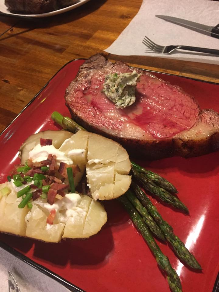Charcoal/Cherry woodsmoked ribeye roast with bourbon butter, smoked spuds and grilled asparagus