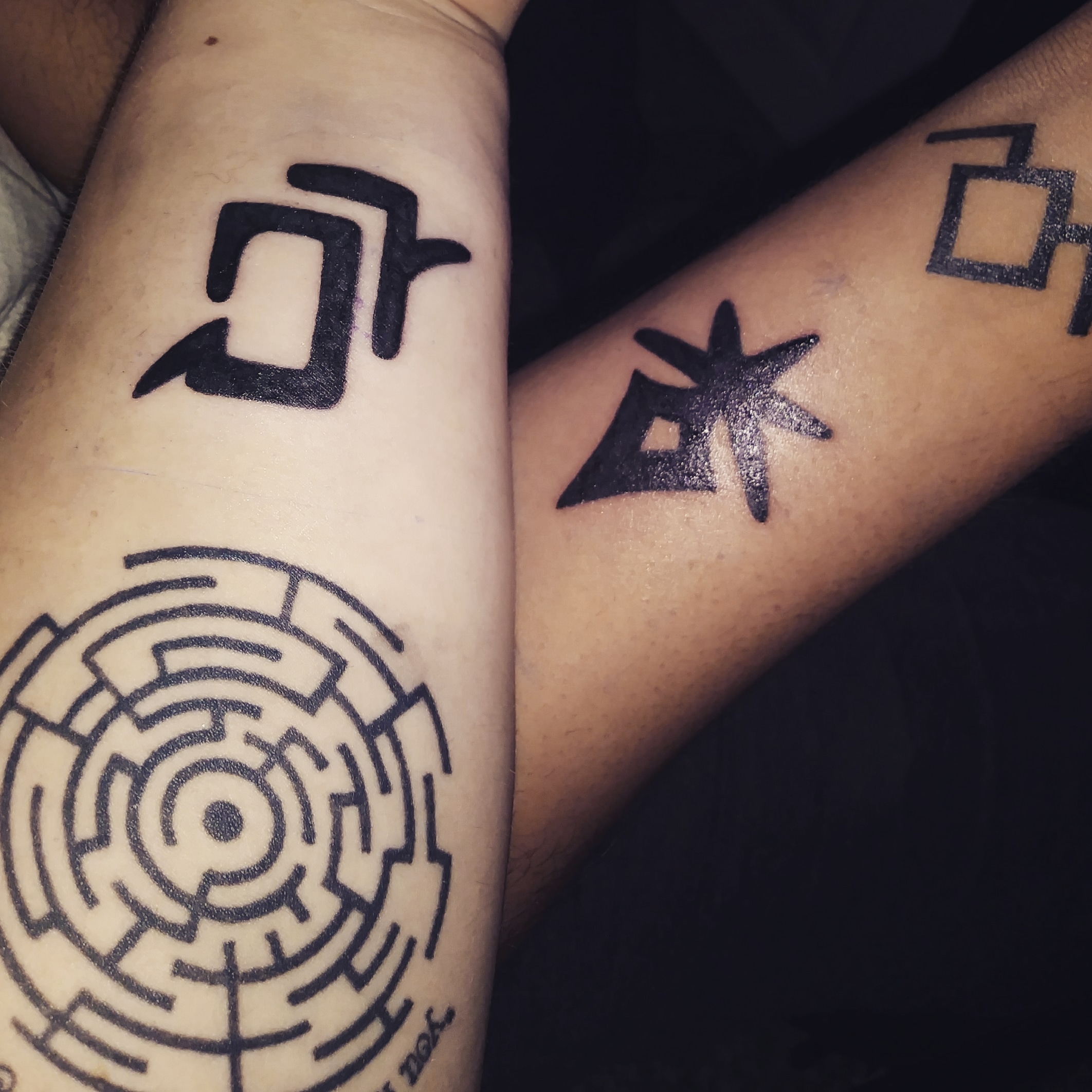 My boyfriend and I got our class symbols tattooed! Astrologian and Dark