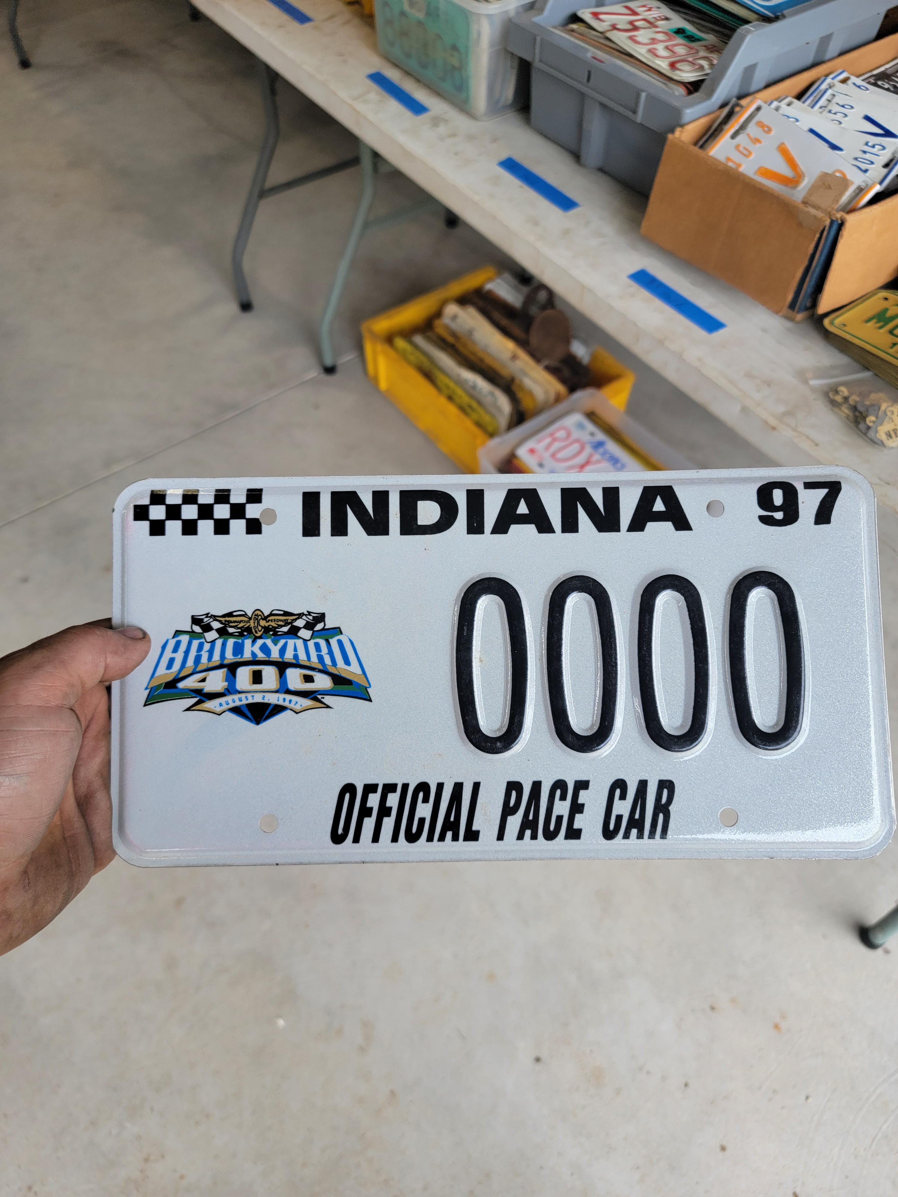 in at a small license plate collectors meet and one of the guys has a
