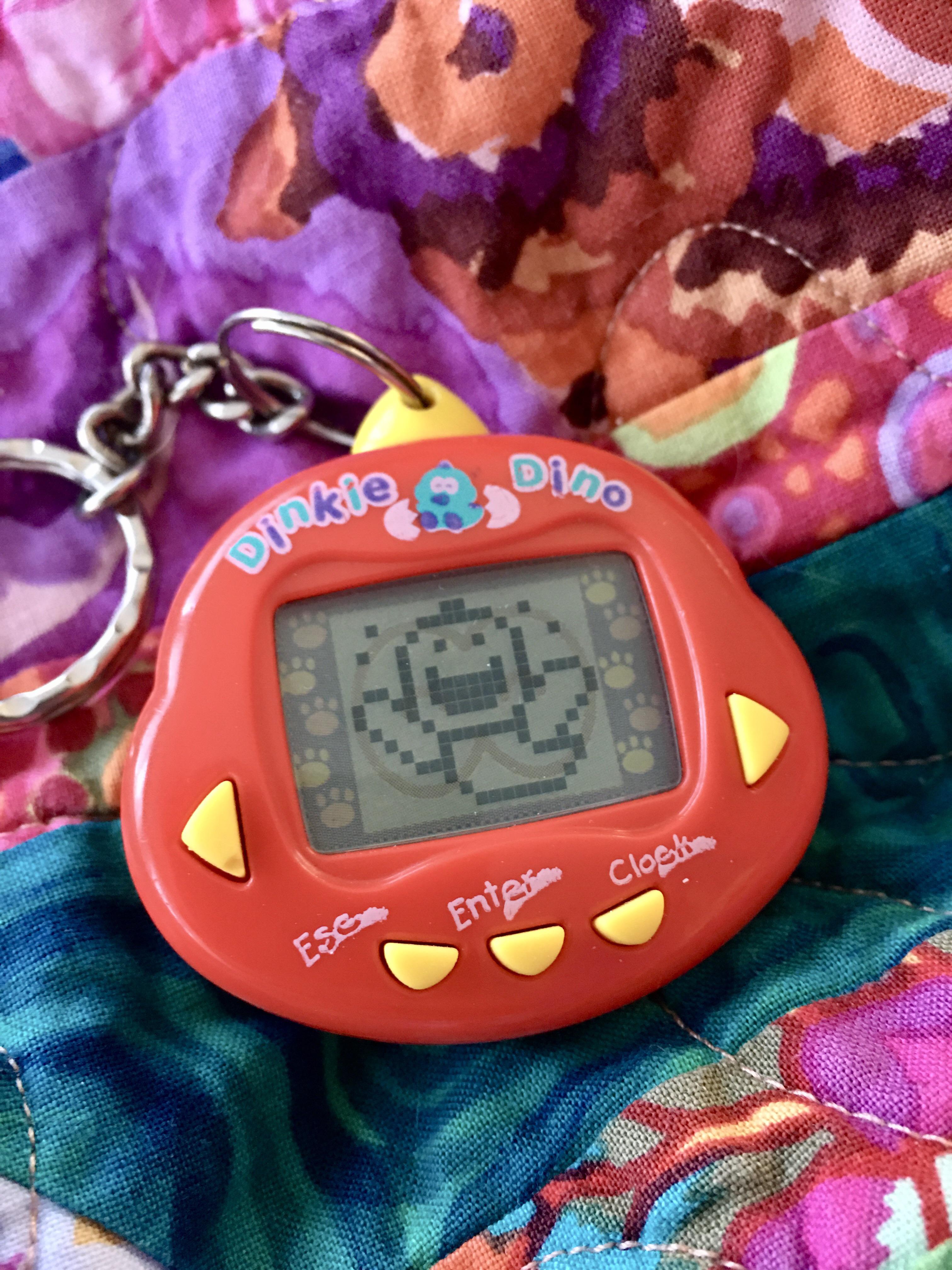 Dinkie Dino is no longer with us, but he looks so happy about it? Did I