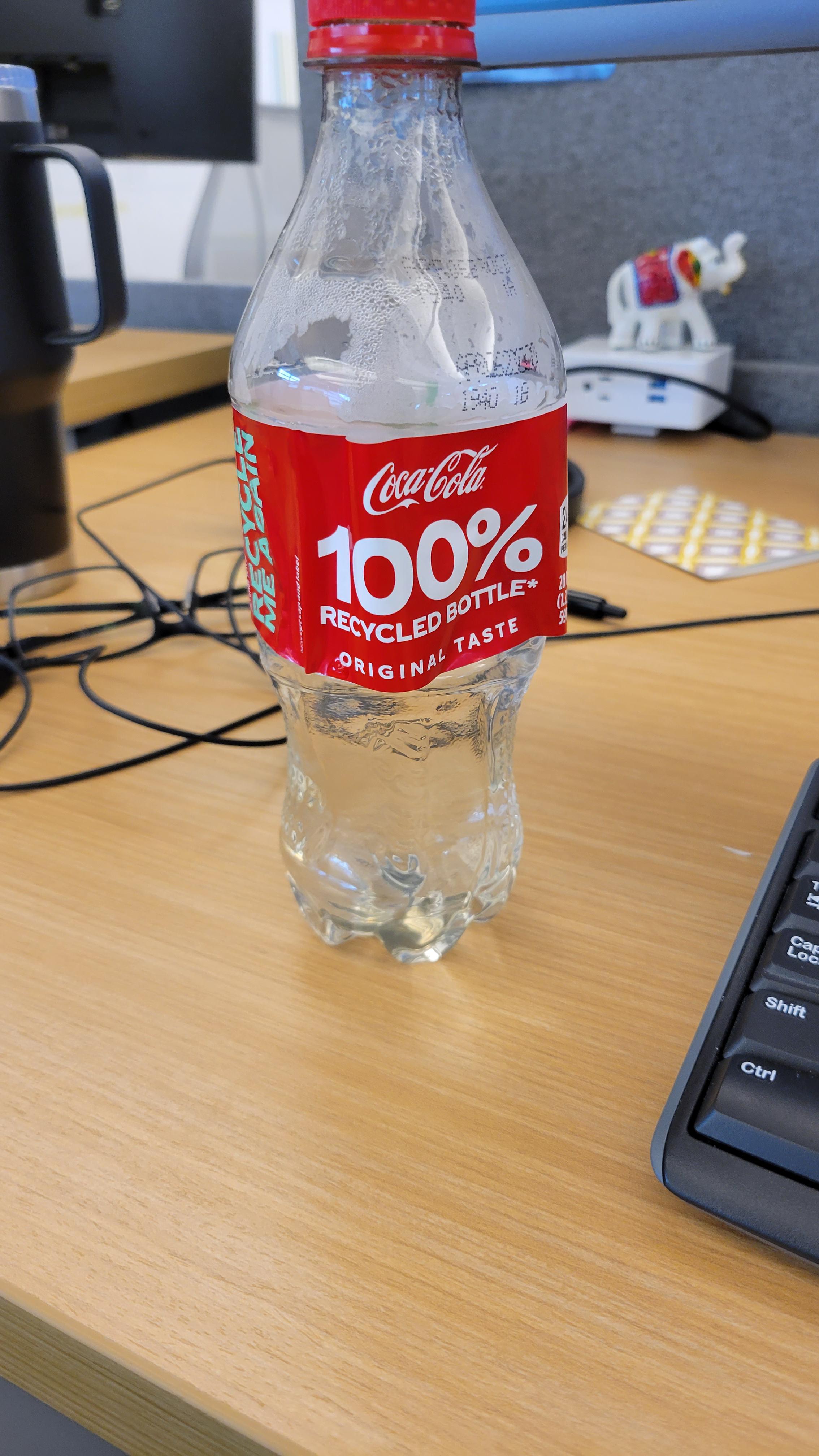 I put hot water in my coke bottle and it shrank. r/mildlyinteresting