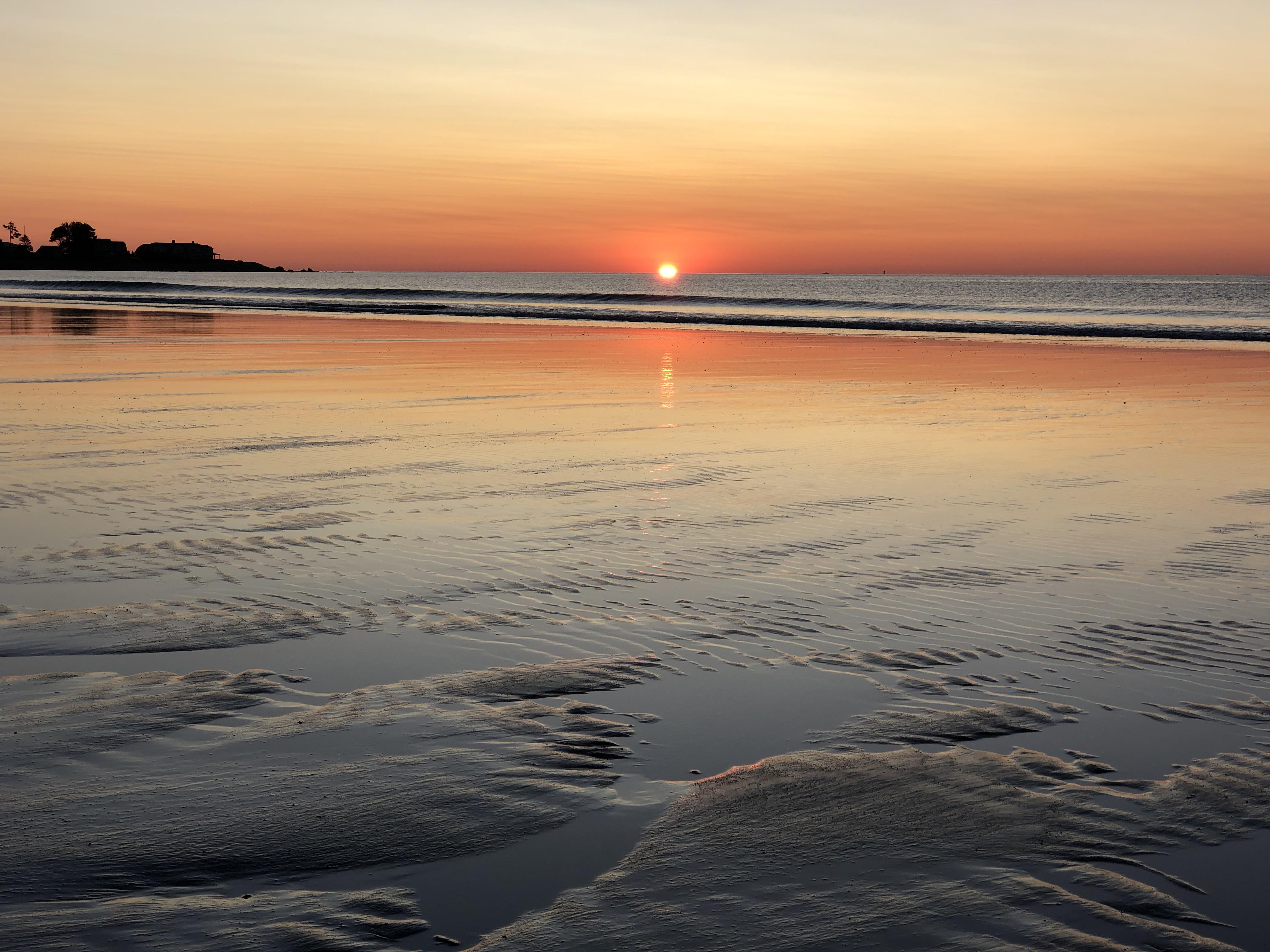 Dawn patrol, Jenness Beach, NH. No waves, but a hella sunrise. r/surfing