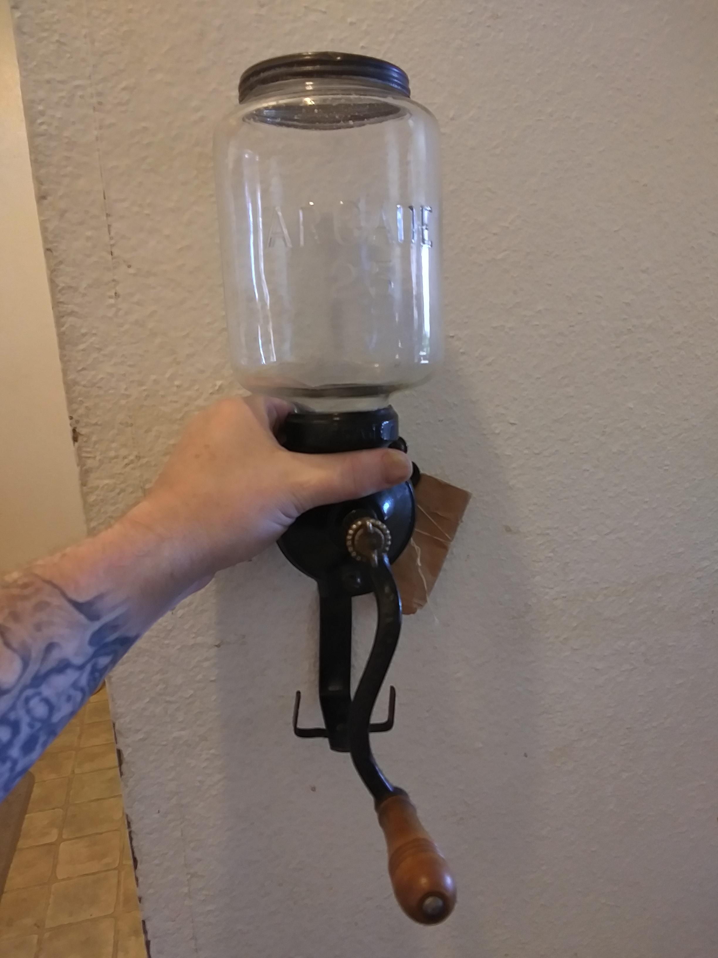 Coffee grinder over 100 years old! Actually found it in the alley