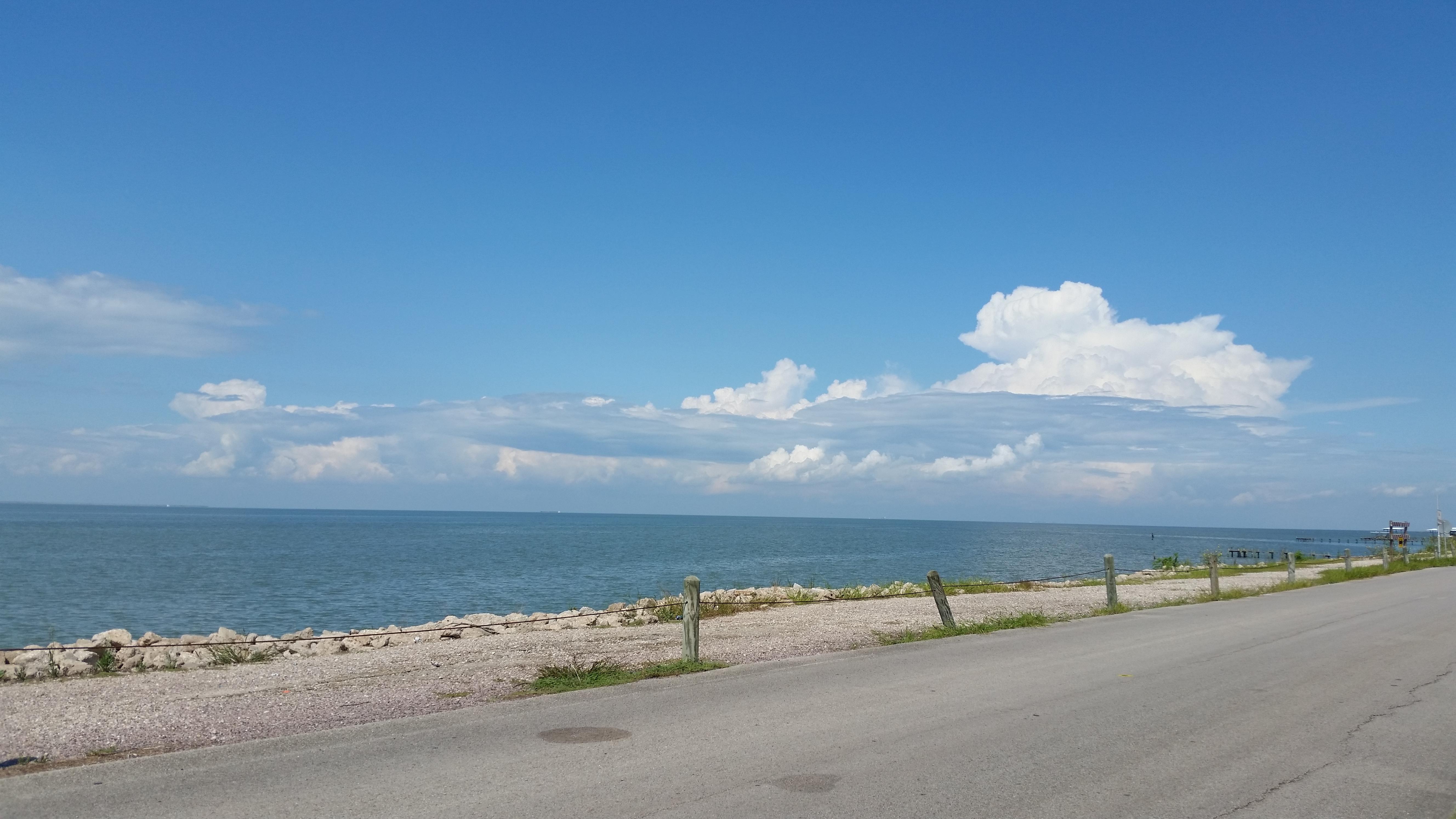 The clouds look like a mountain range. r/pics