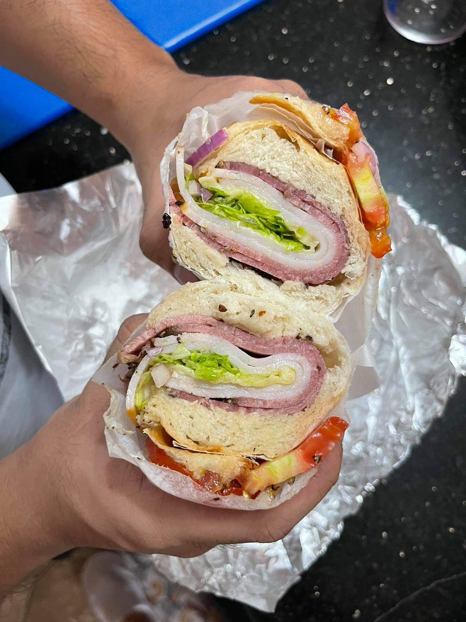 Turkey and Pastrami, homemade hoagie roll, lettuce,tomato,onion,oil