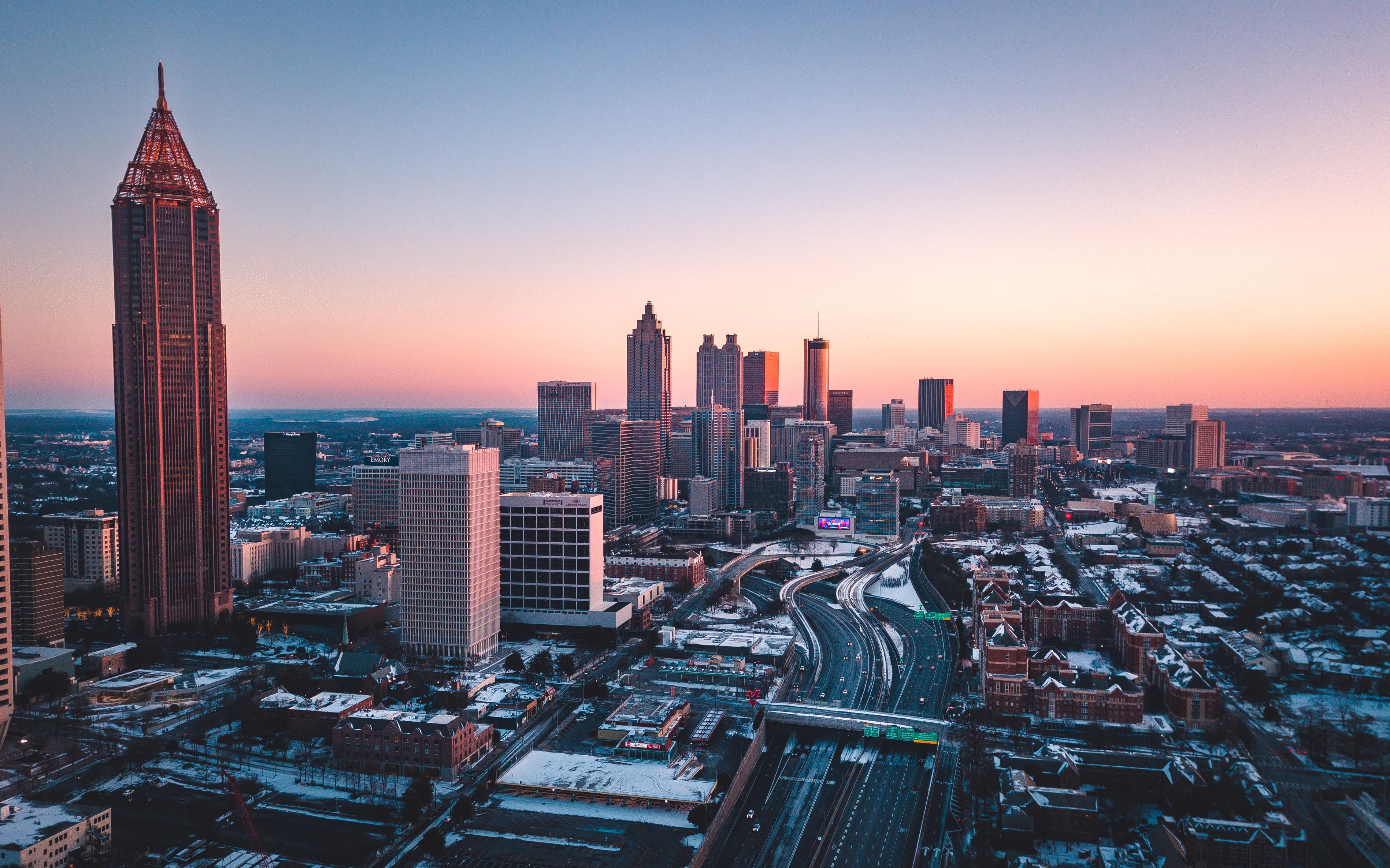 The Downtown skyline under the snowy sunset r/Atlanta