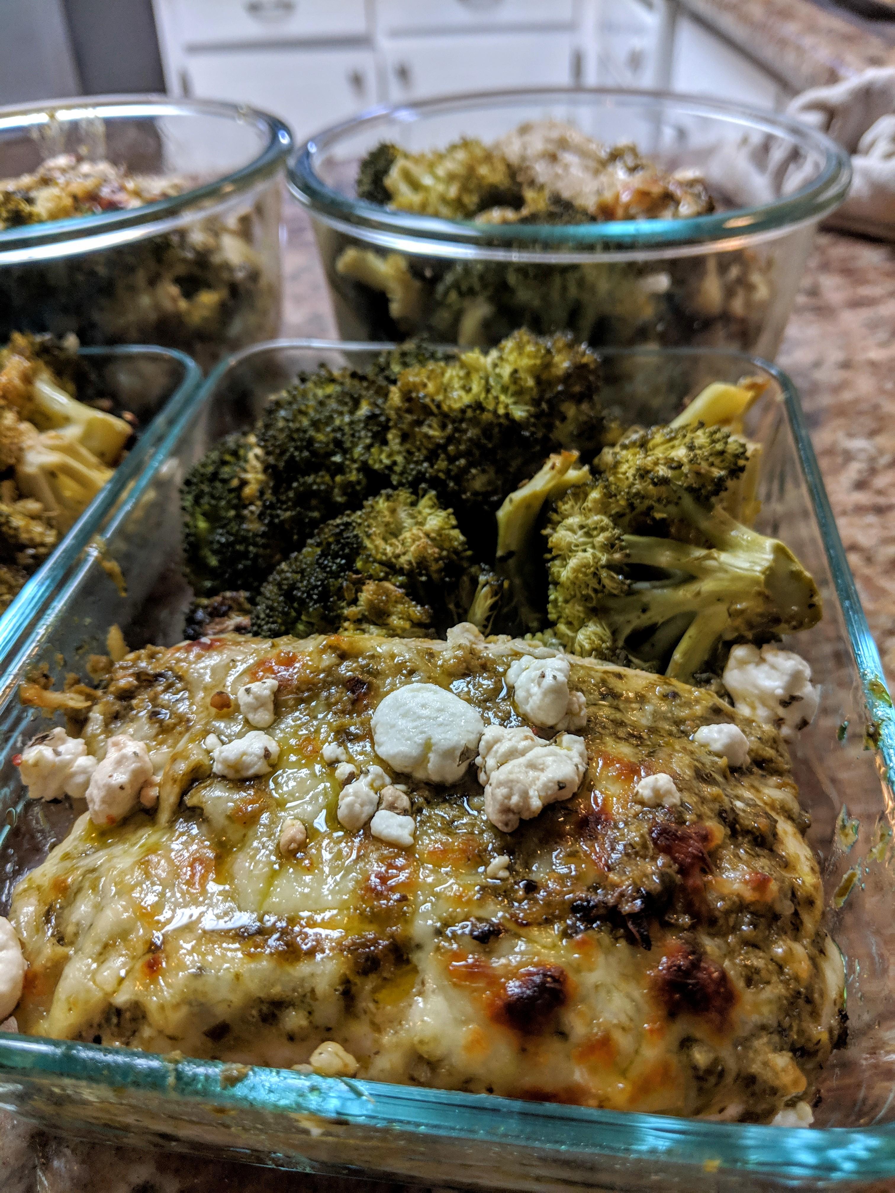 Baked pesto chicken with roasted broccoli and brown rice. Looking