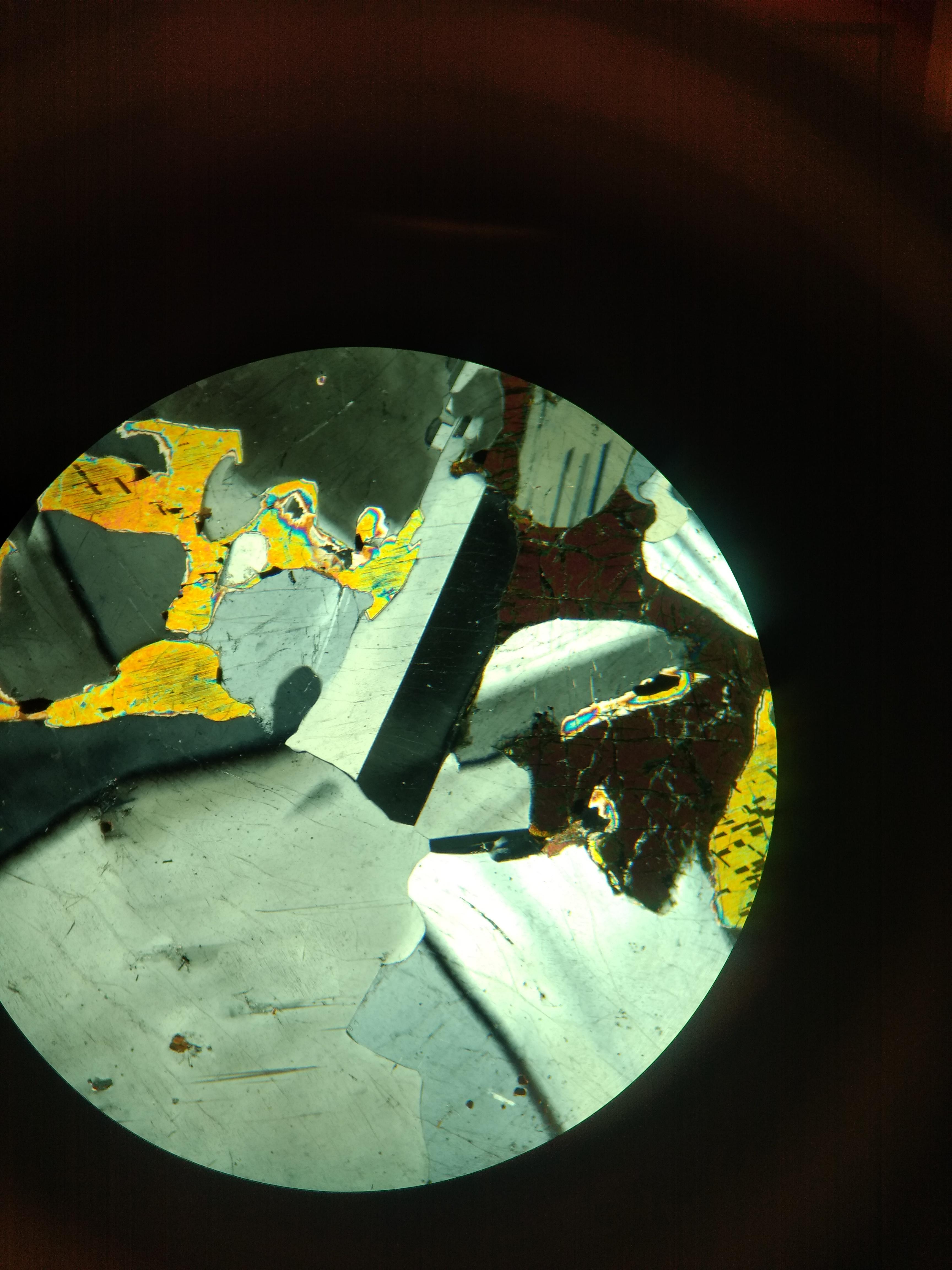 Beautiful Carlsbad Twinning of Quartz (XPL) thinsectionporn