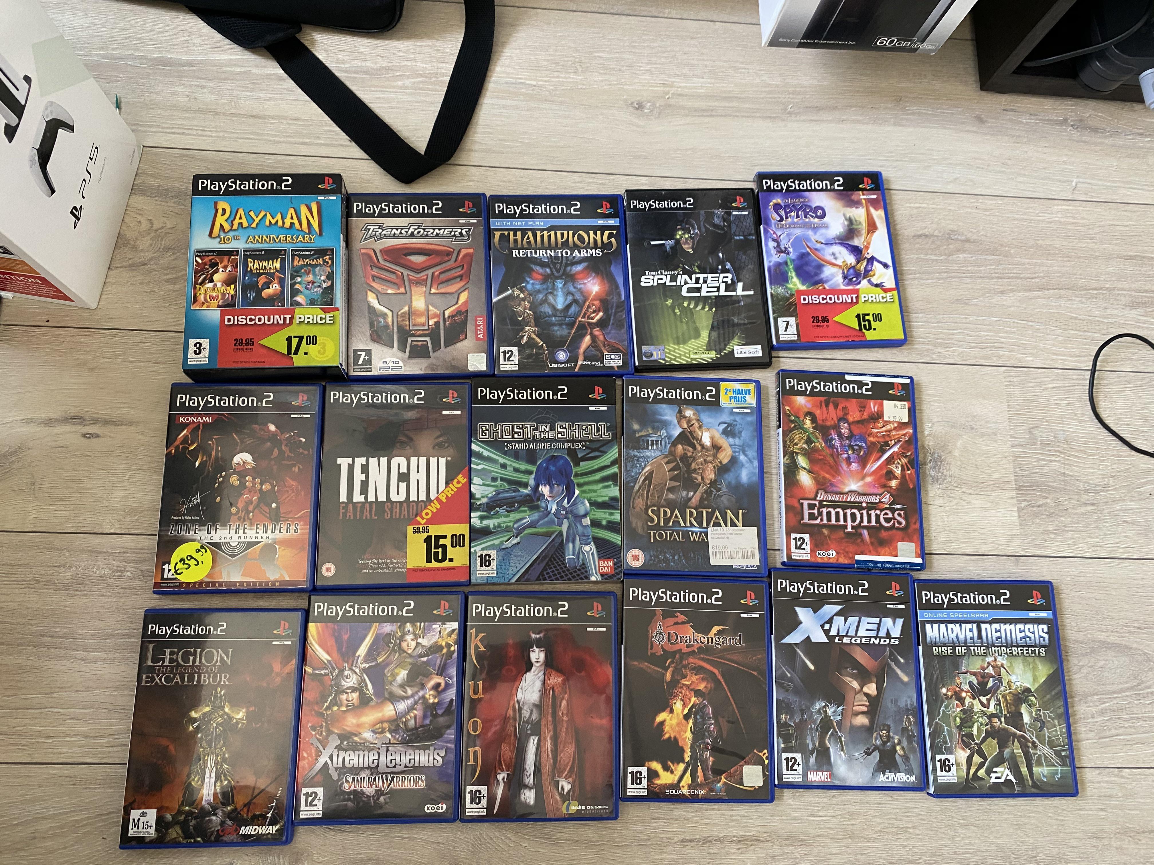 Brother in law gifted me his old ps2 games! sweetdeals r/ps2