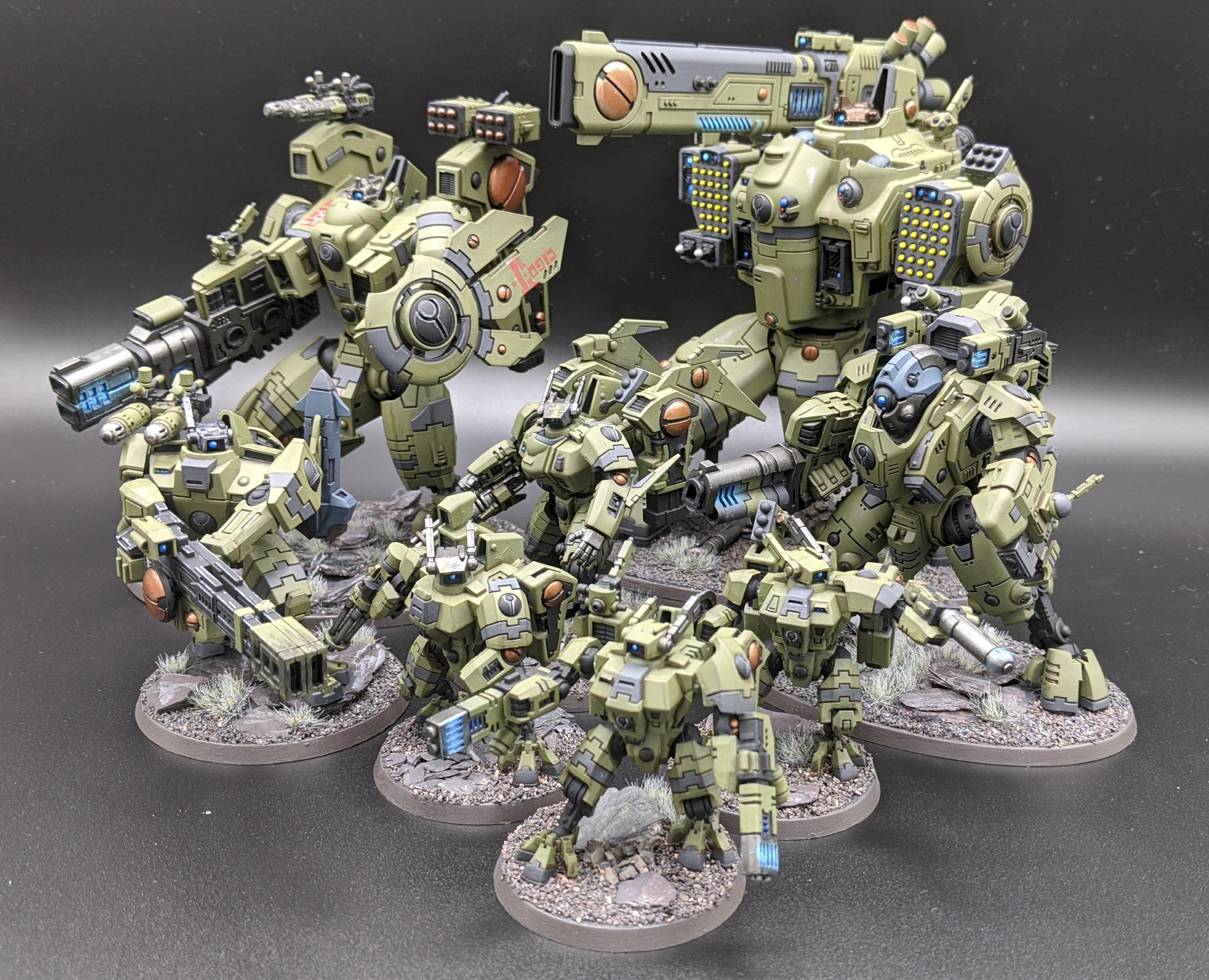 My Tau army so far. Armor colors inspired by Master Chief from Halo