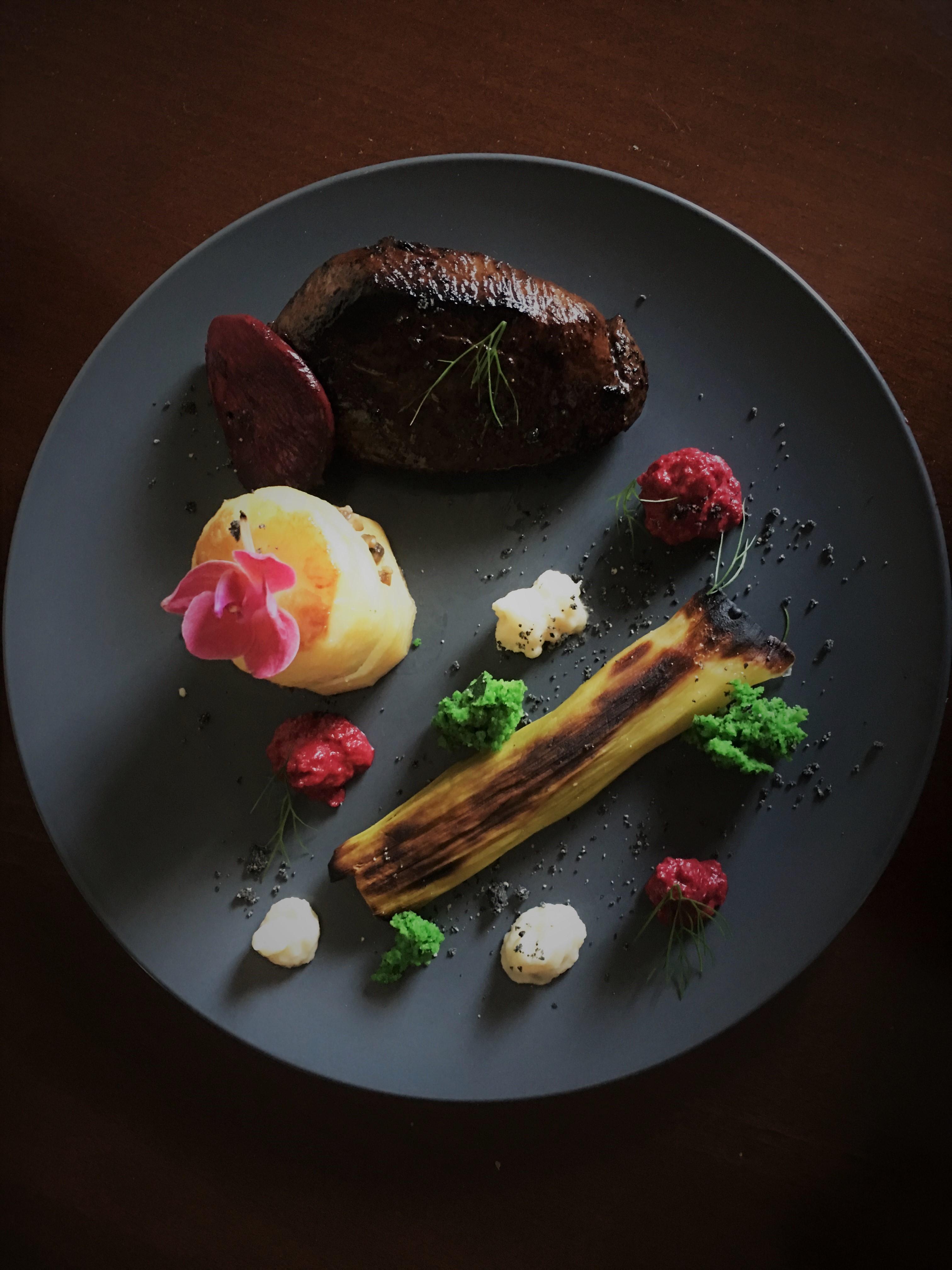 red wine marinated kangaroo duxelles sandwiched between potato