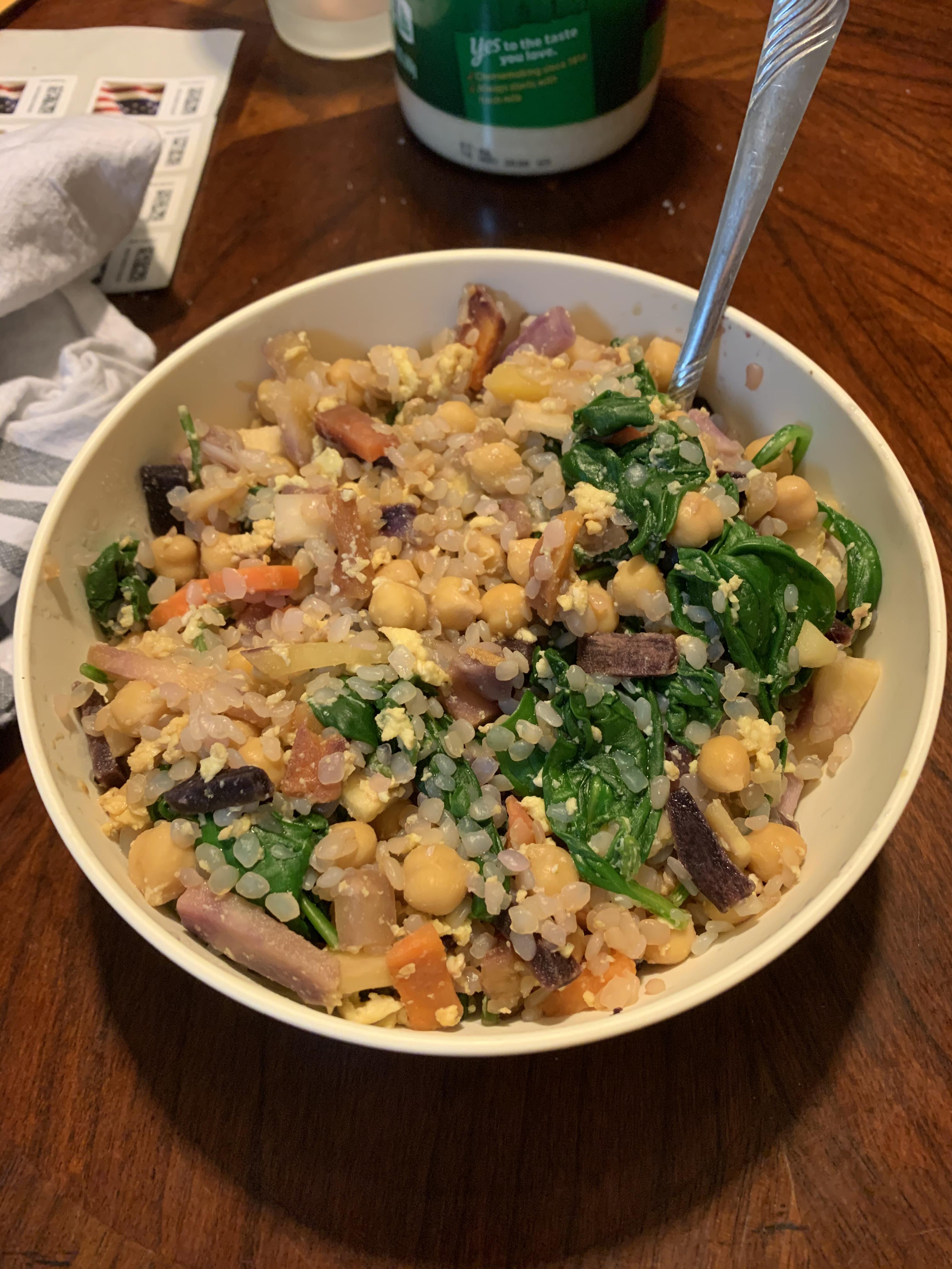 Miracle fried rice, chickpeas, egg, spinach, and root vegetable medley