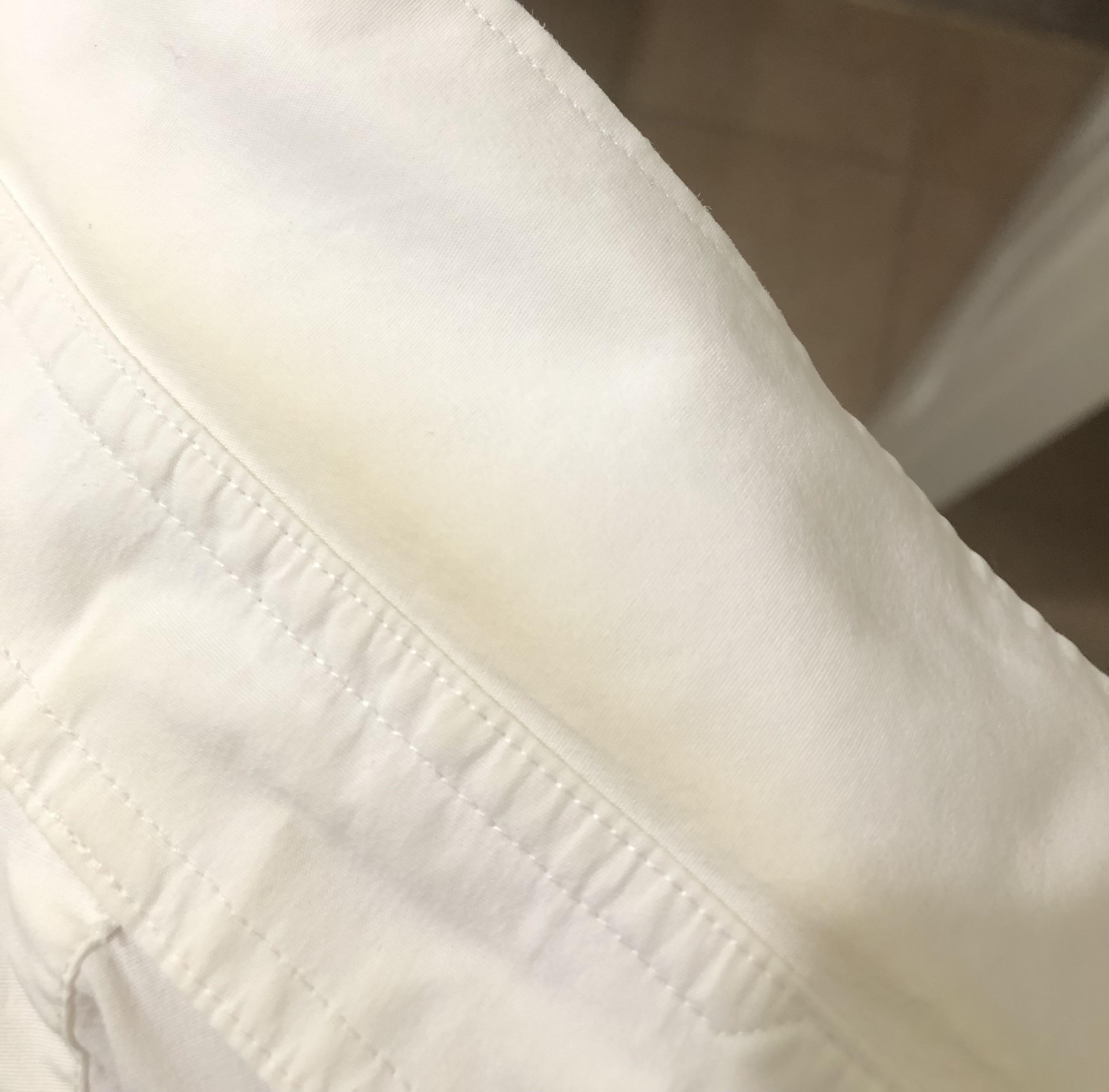 Back to work after 18 months, white dress shirts are now yellow. I