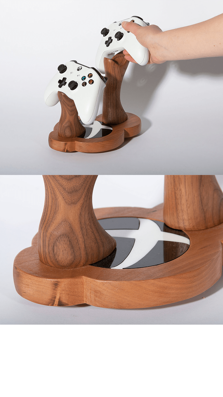 I made this Xbox controller stand in the wood shop. Laser cut the Xbox logo acrylic detailing