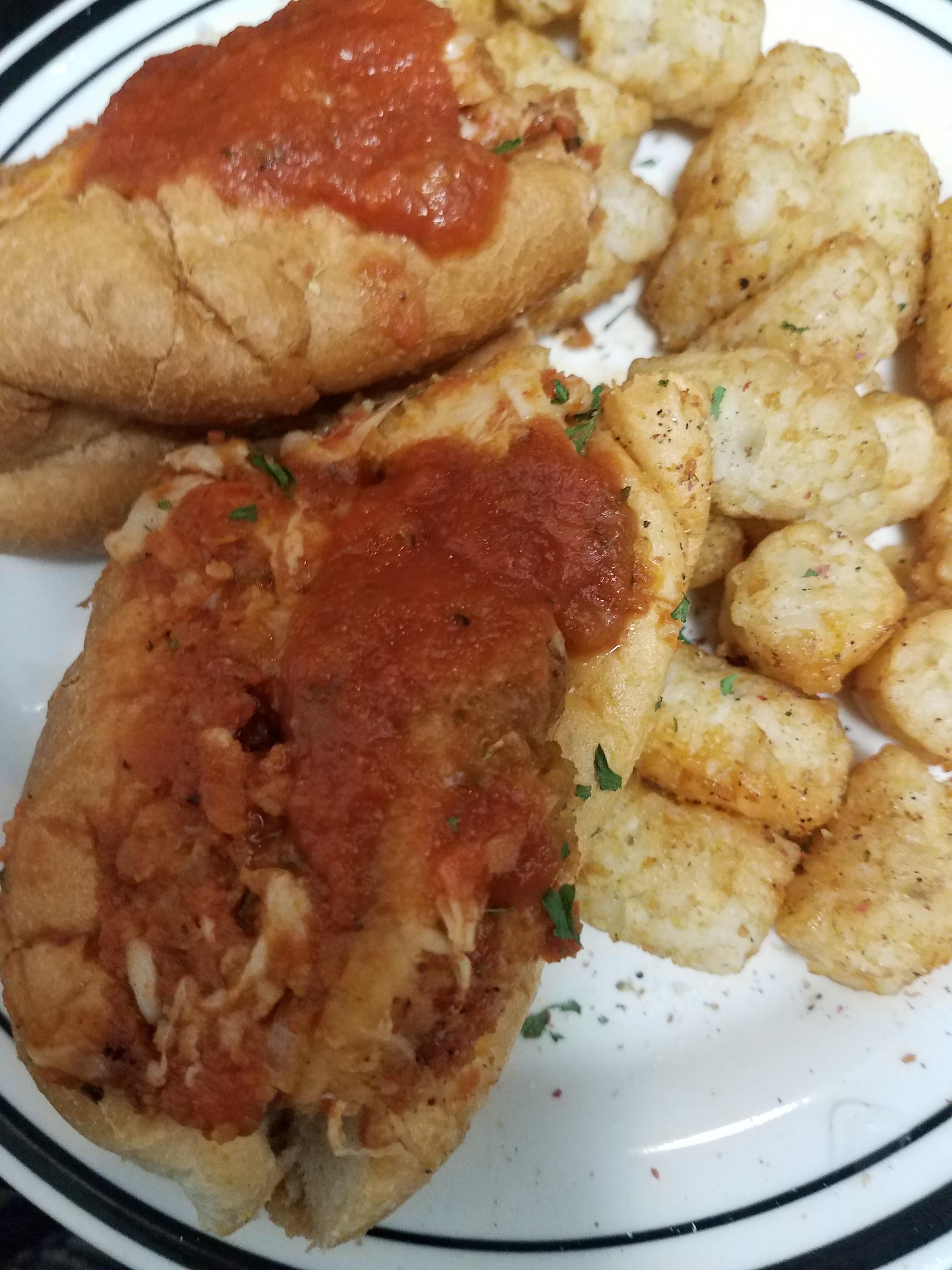 Chicken Mozz Sammy, with extra sauce and tots r/Sandwiches