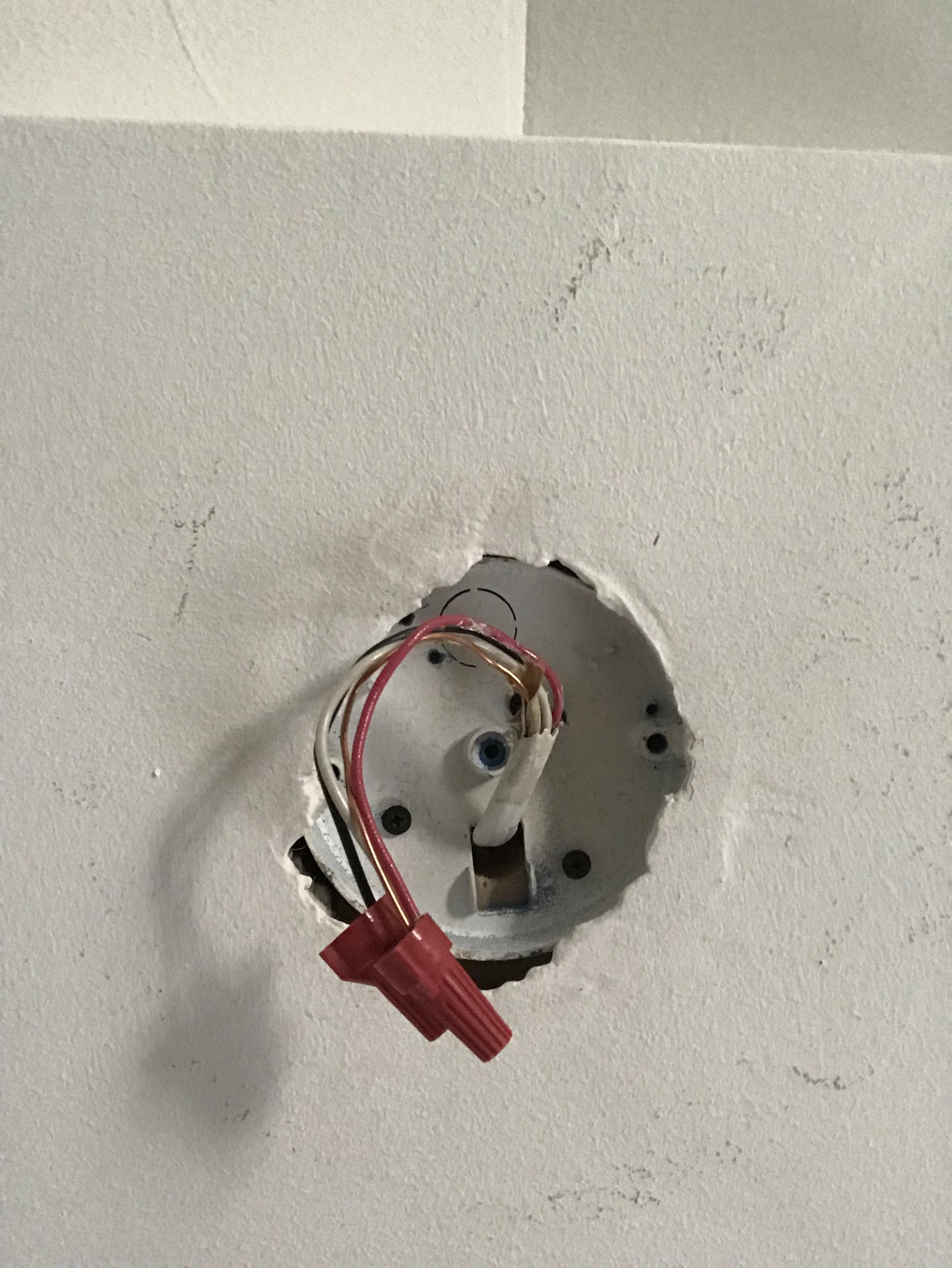 I was attempting to install a ceiling fan but the existing outlet box