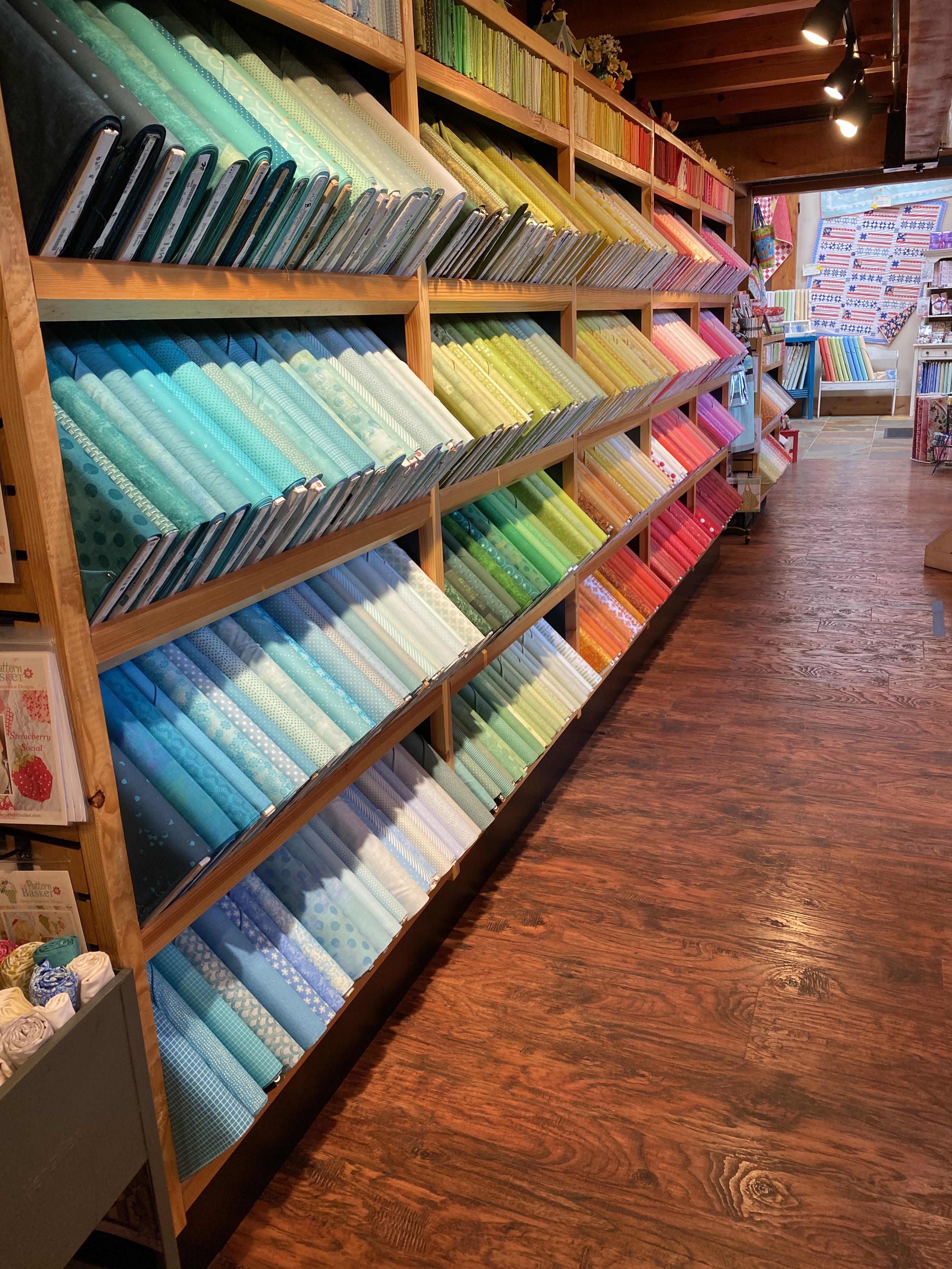 The way this fabric is organized at the quilt store I I visited today