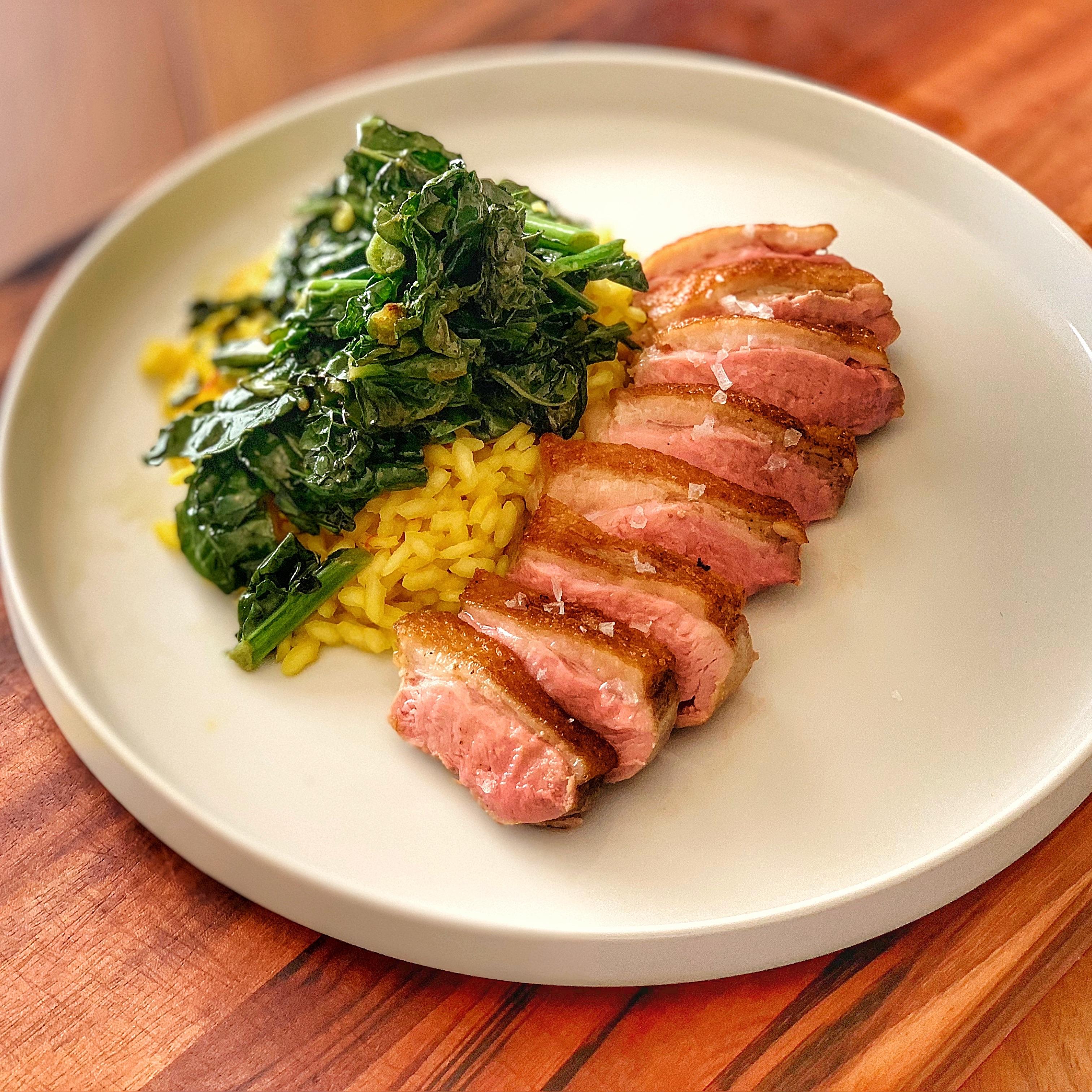 Sous Vide Duck Breast, Saffron Risotto, Duck Fat Fried Kale r