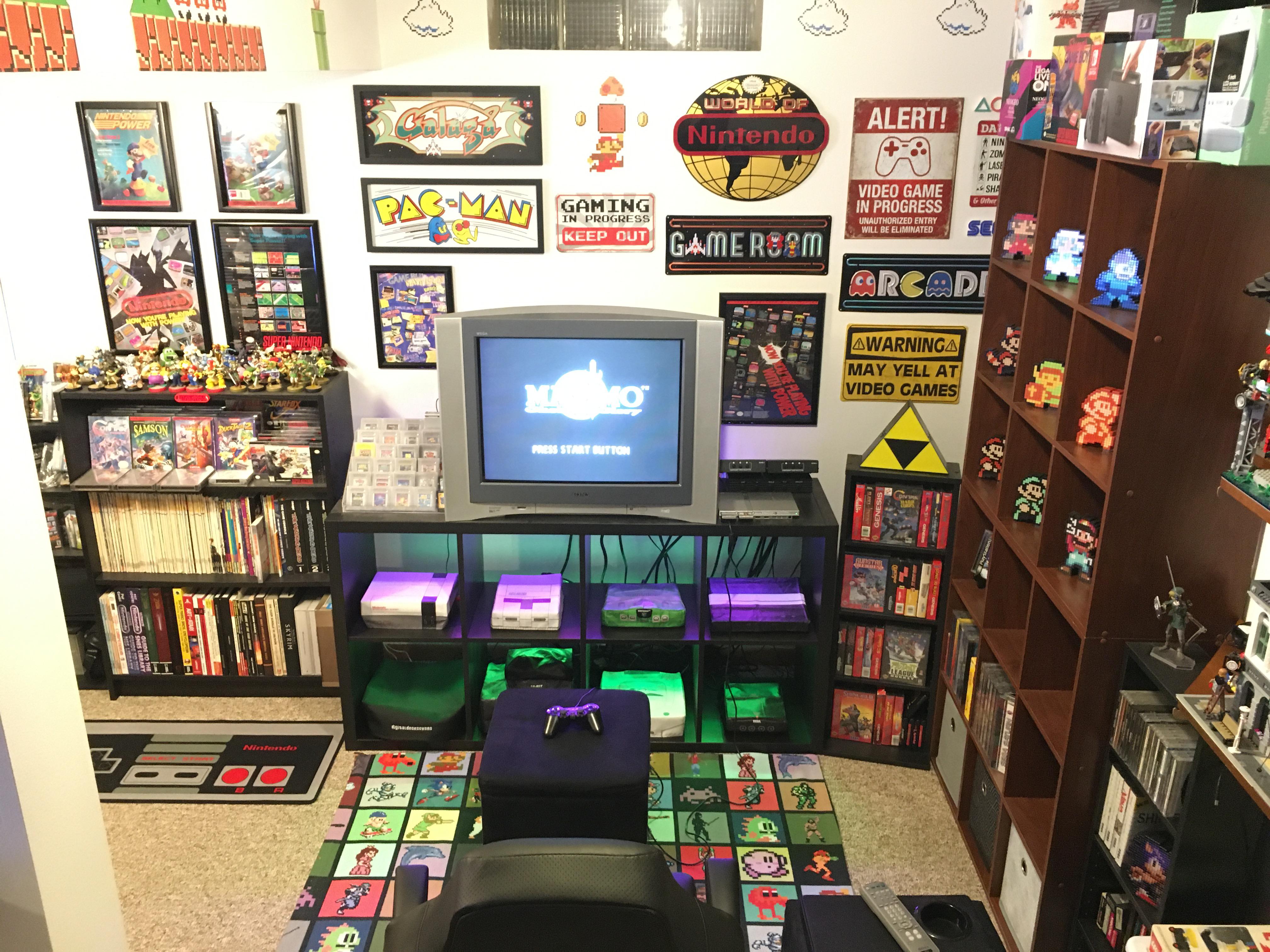 A little corner of my man cave. 13 consoles total all ready to go. r