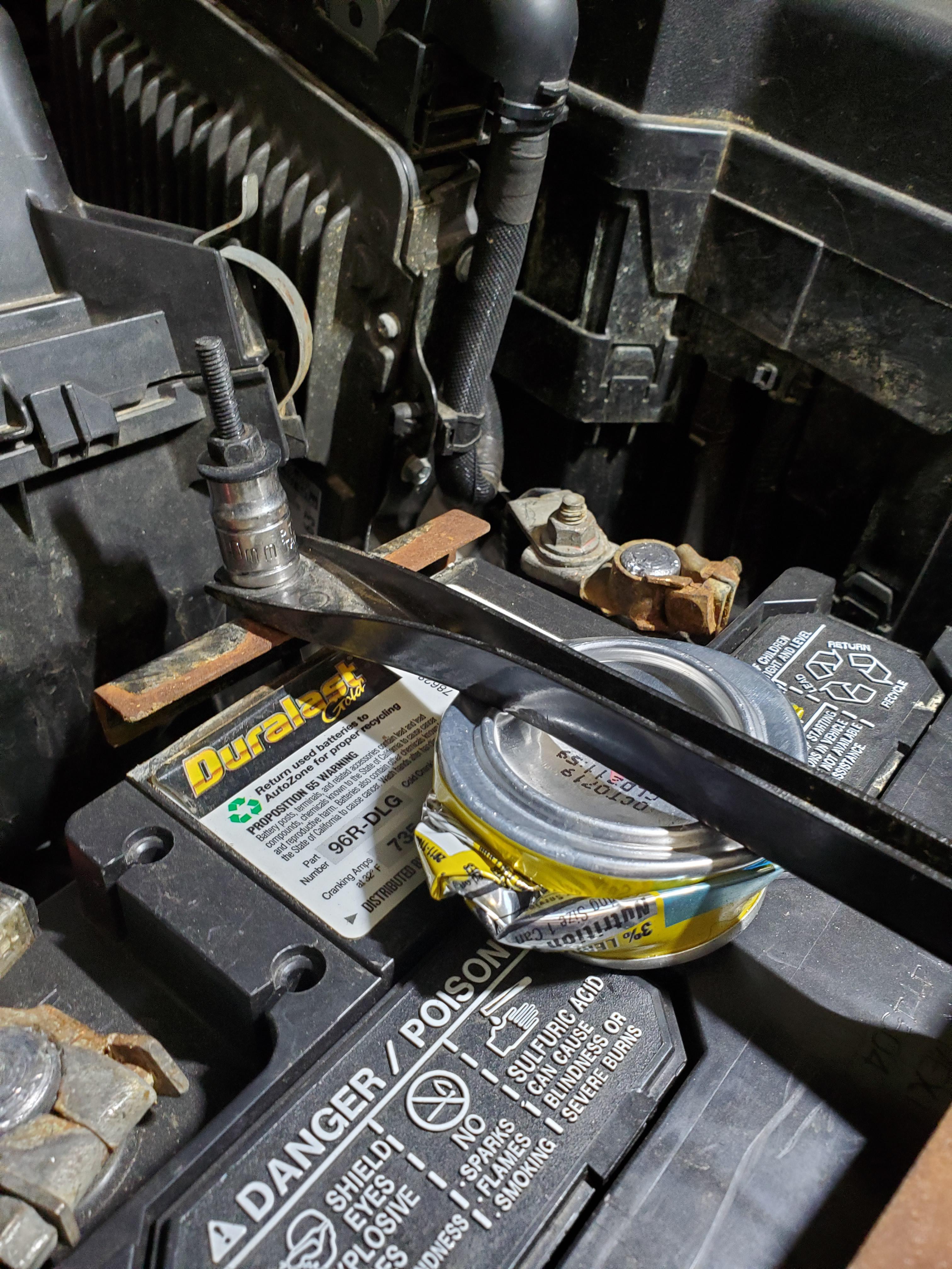 Battery too small? No problem. And yes, that's a 10mm used as a spacer