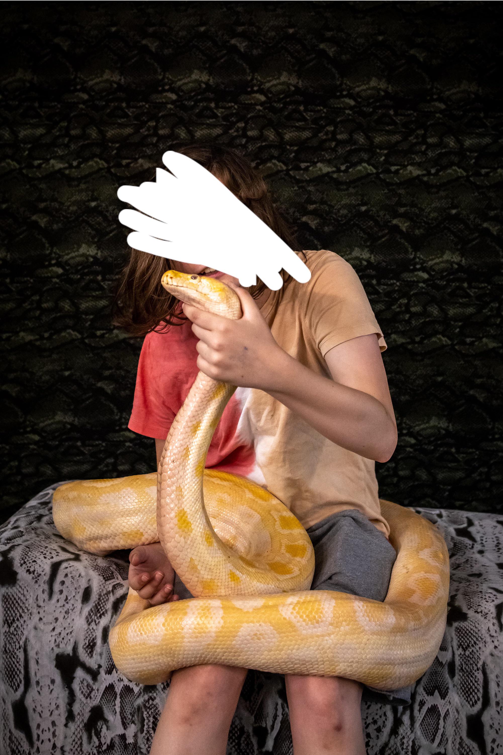 Me wow that’s so cool I get to hold a giant snake, my dream pet, and