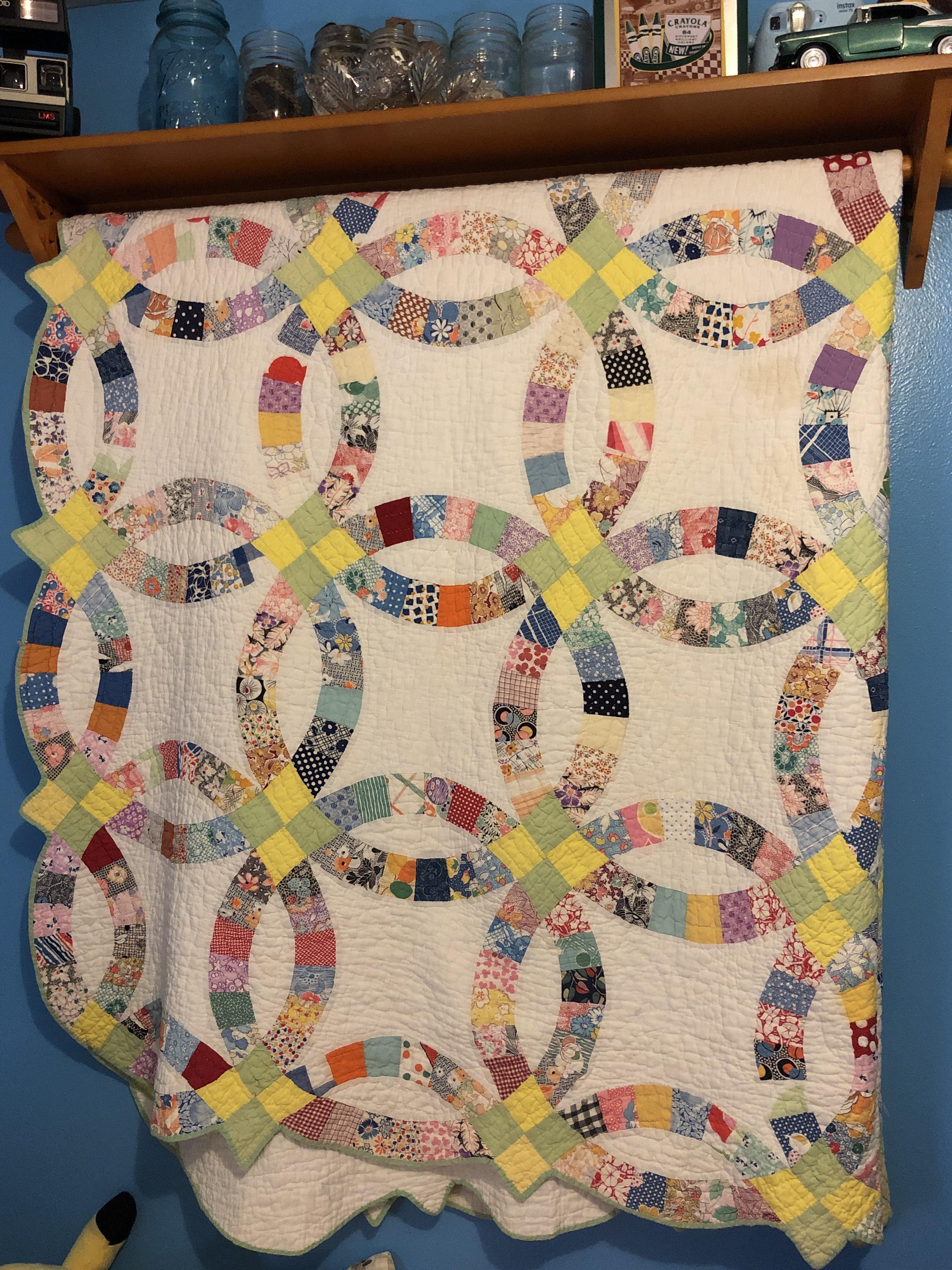 Won this quilt from the goodwill site! All hand stitched and veryyy