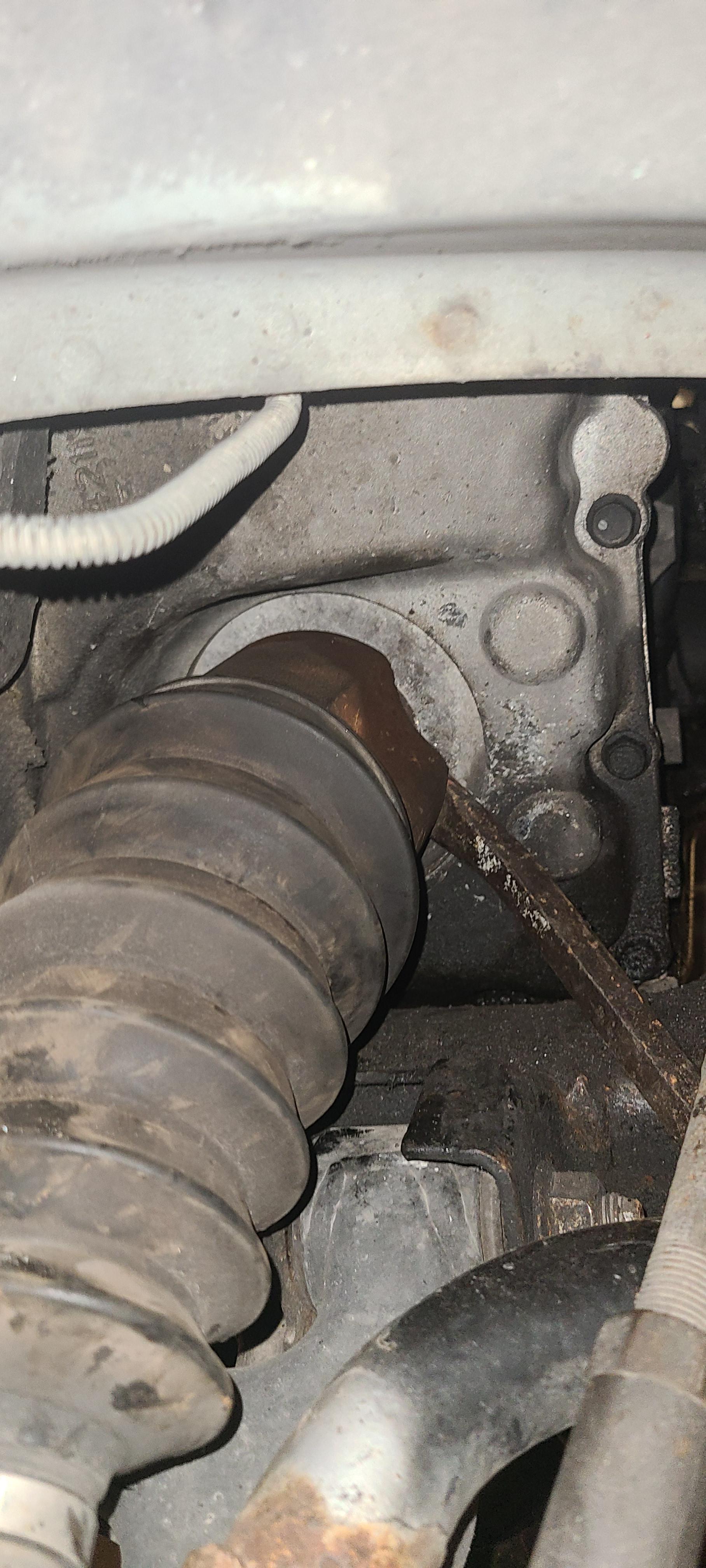 I've been prying and hitting this CV axle for a while now and its