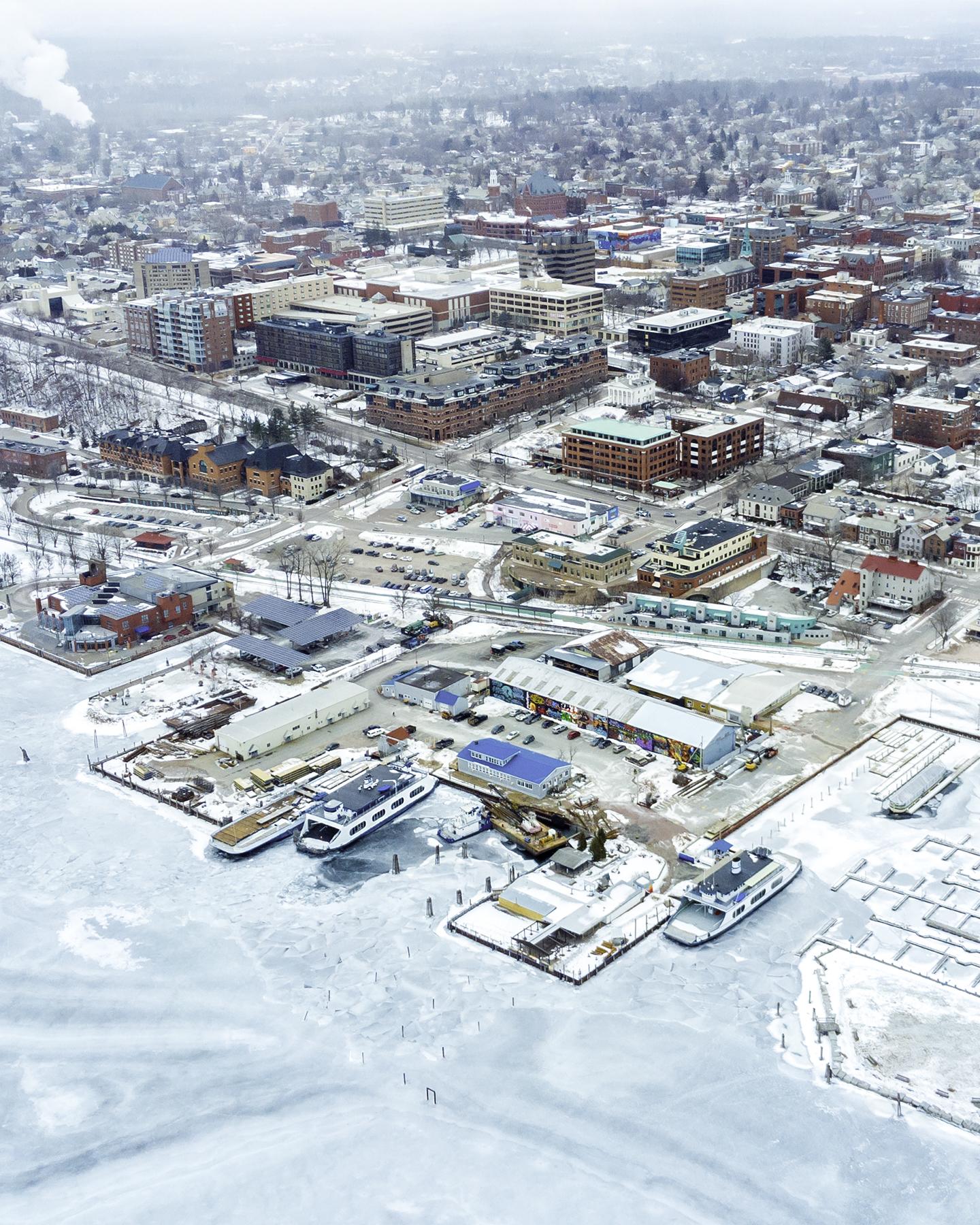 A frozen Lake Champlain and Snow Covered Burlington r/vermont
