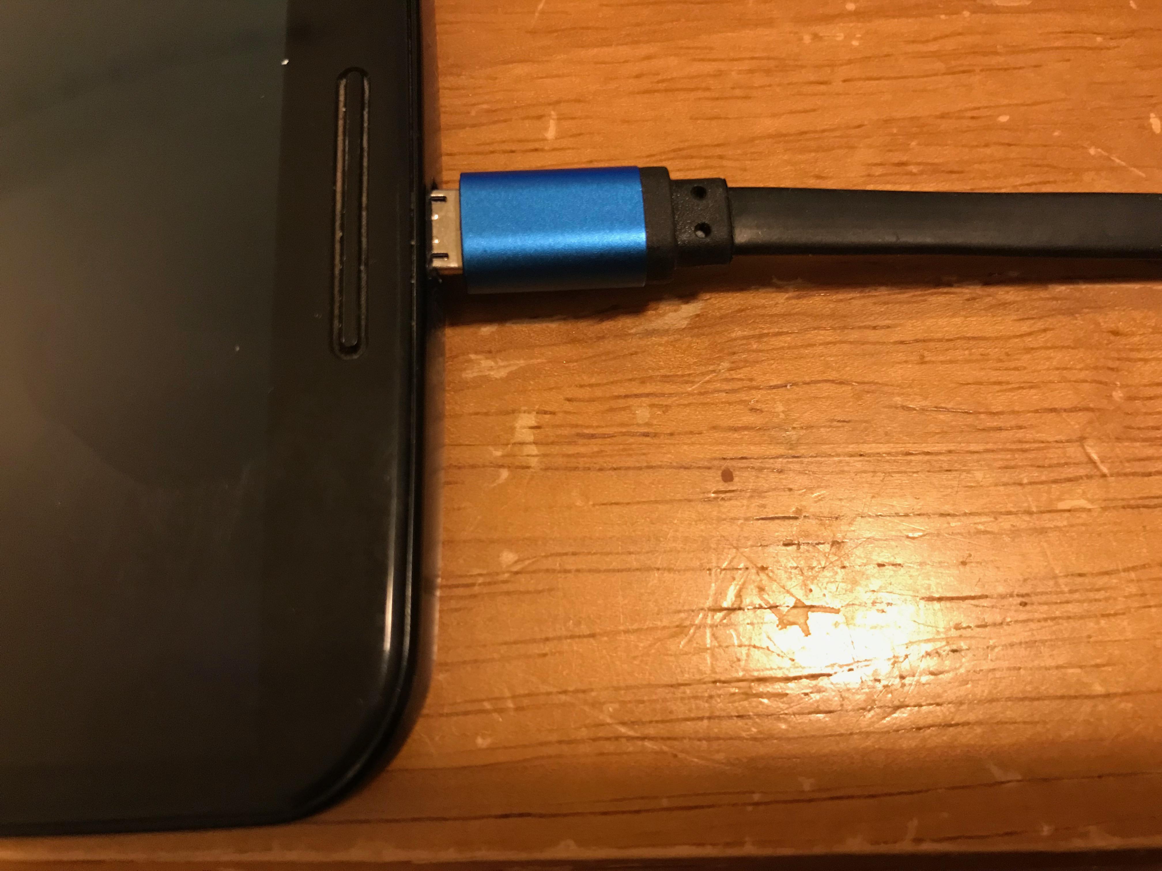 Does anyone else's N6 charging cable not really plugin completely? This occurs with any cable