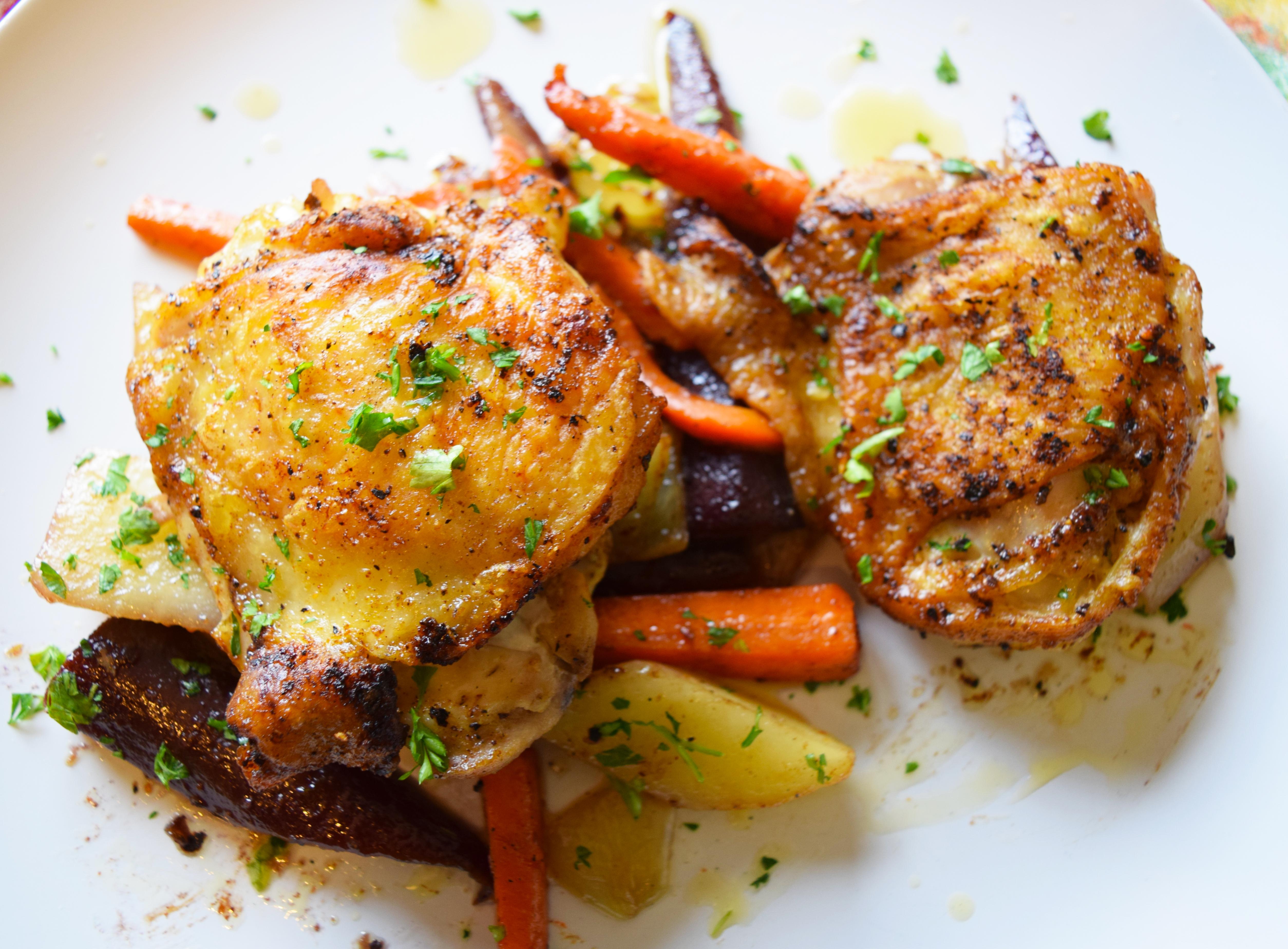 [Homemade] cast Iron Skillet Crispy Chicken Thighs with Carrots, Onion