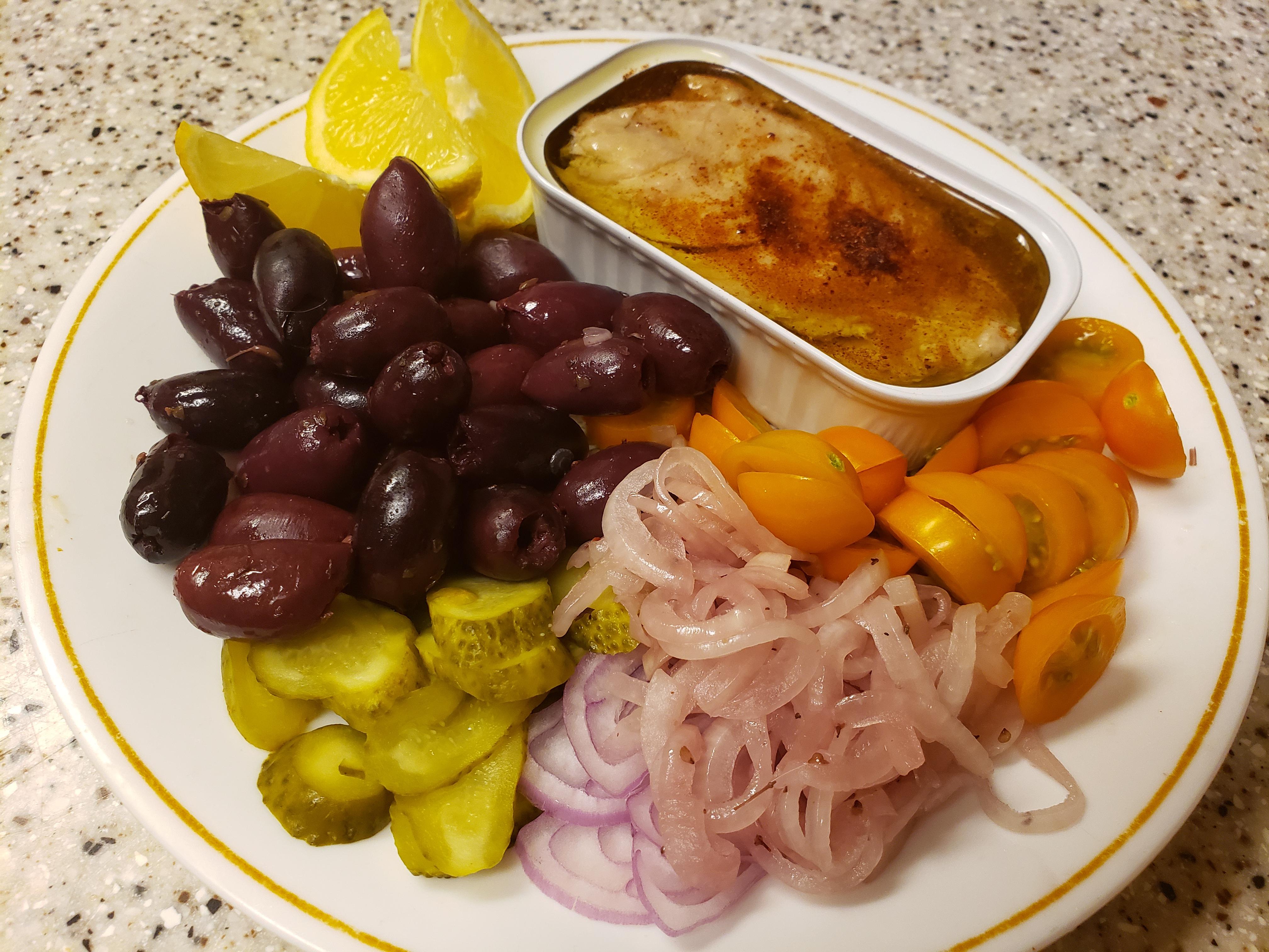 Safecatch mackerel with smoked paprika, shallots, pickled onions, baby