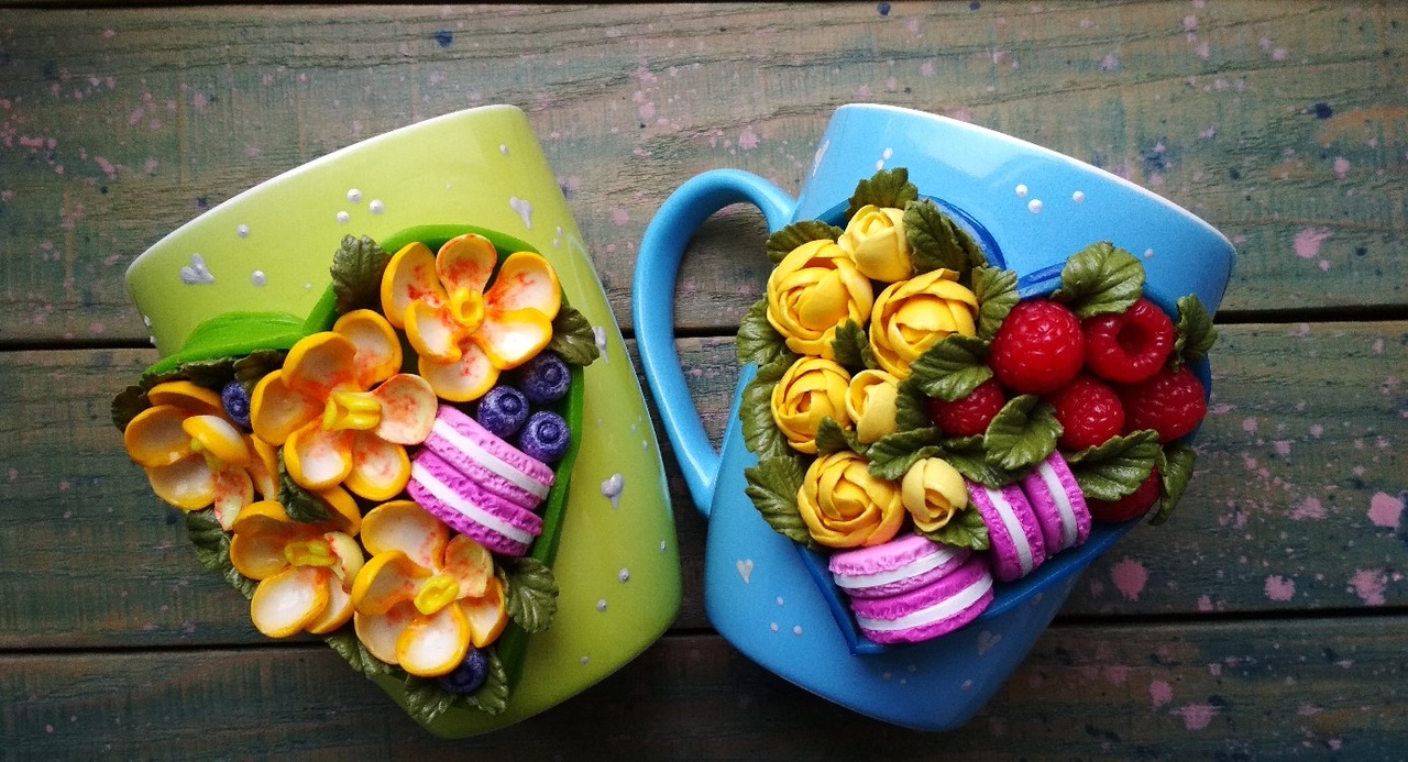 I completed clay decorated mugs with flowers, sweets and fruits handmade