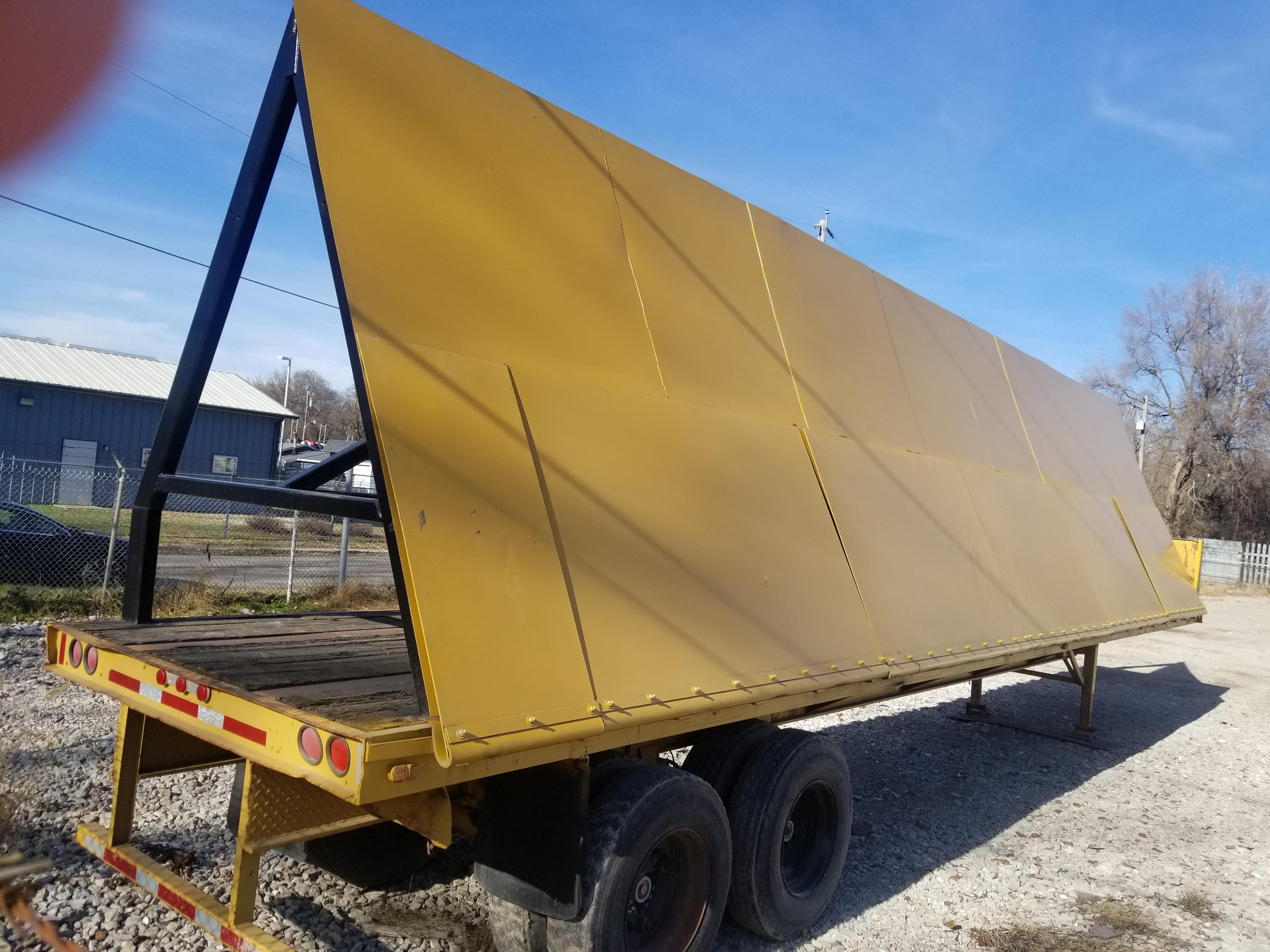 What is this demolition site trailer used for? The wall is set at a