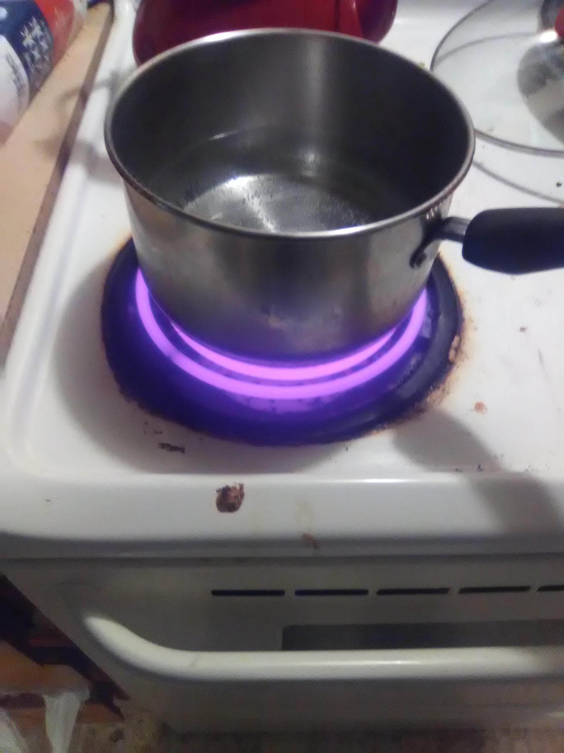 My phone camera made stove element look purple. r/mildlyinteresting