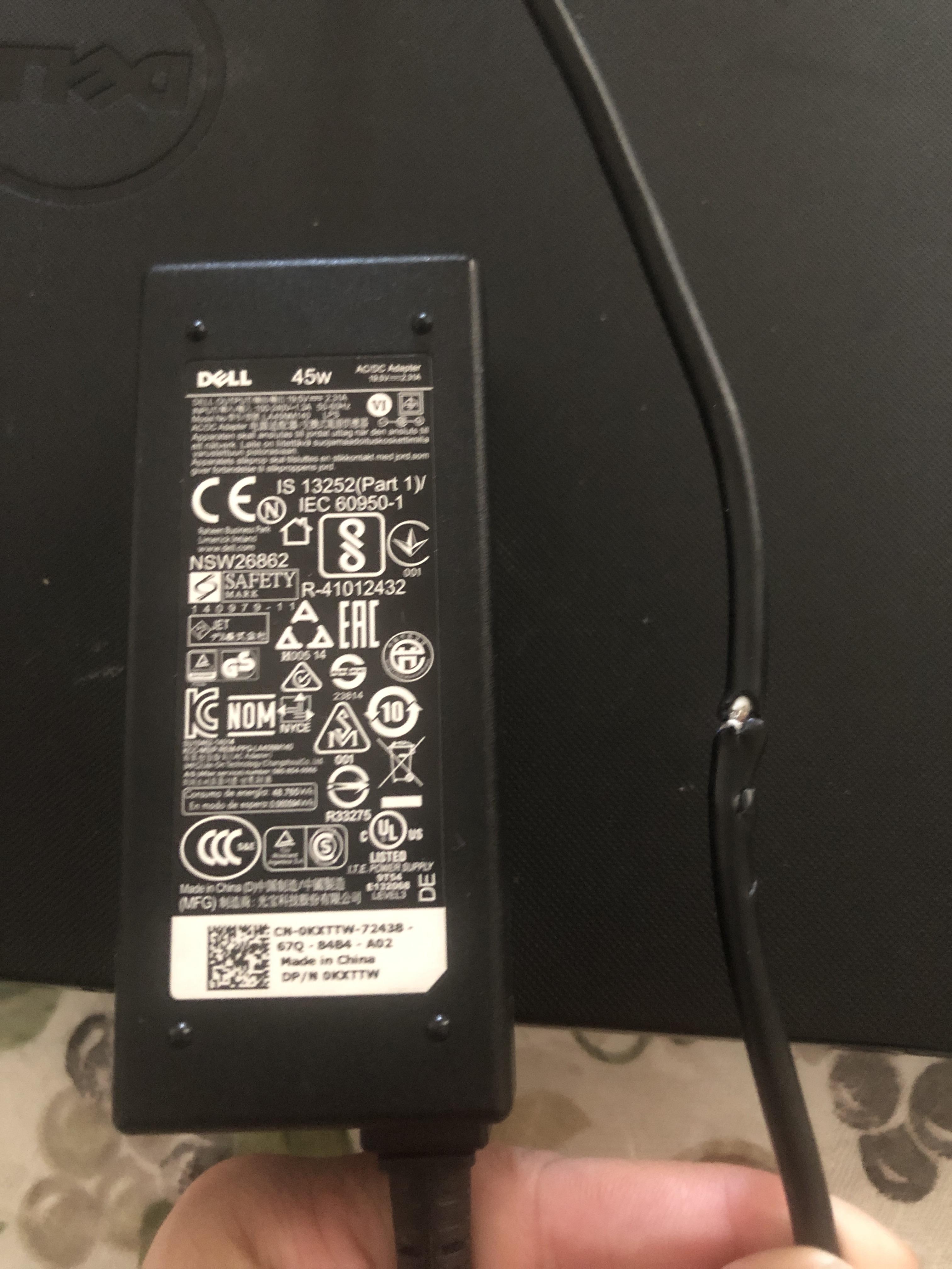 Puppy chewed up charger. Made electrical noises and sparked when I