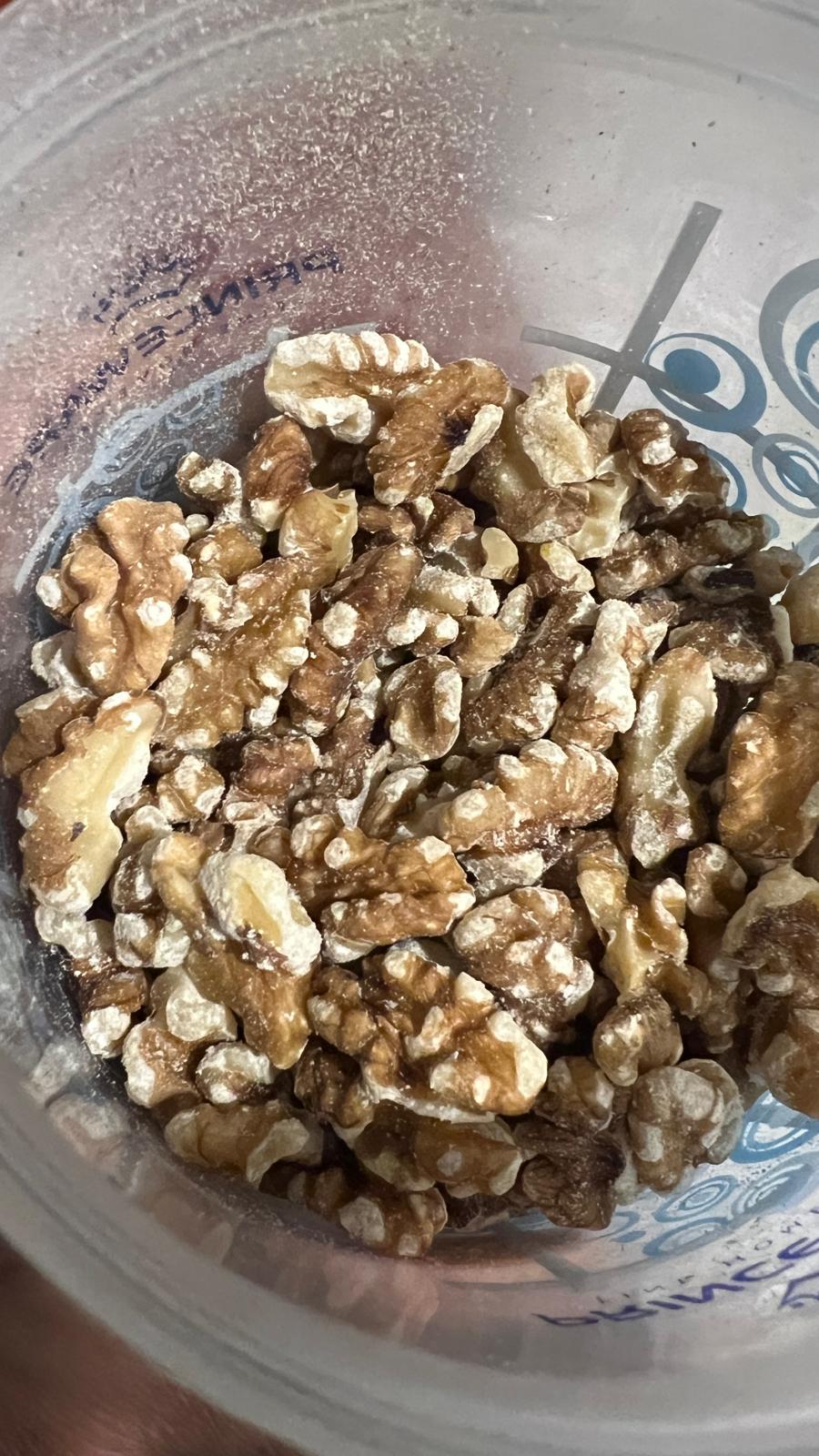 What is the white powder on walnuts stored in freezer? Are walnuts