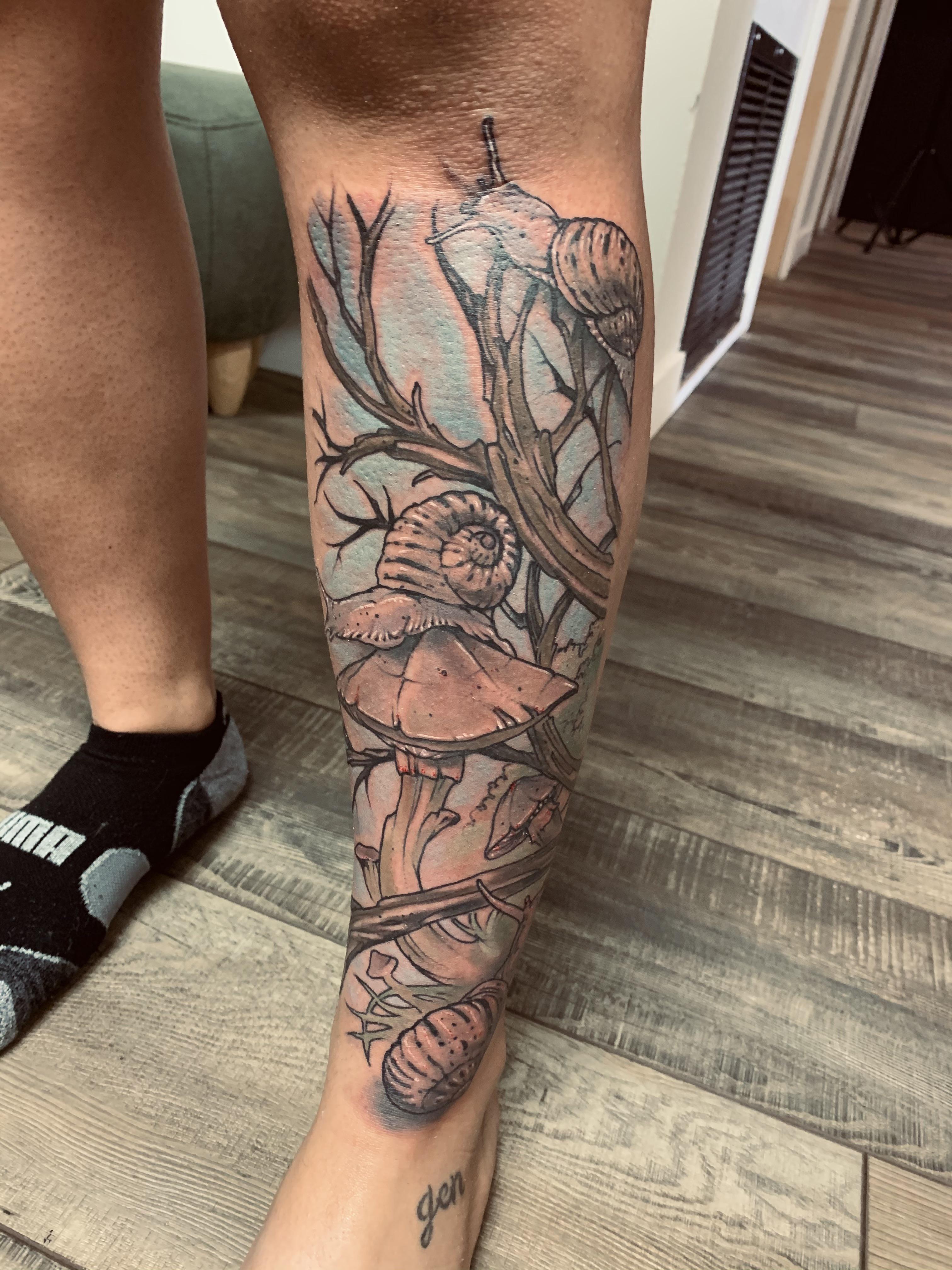 Snails by Dustin Ward at Bombshell Tattoo Edmonton Alberta Canada r